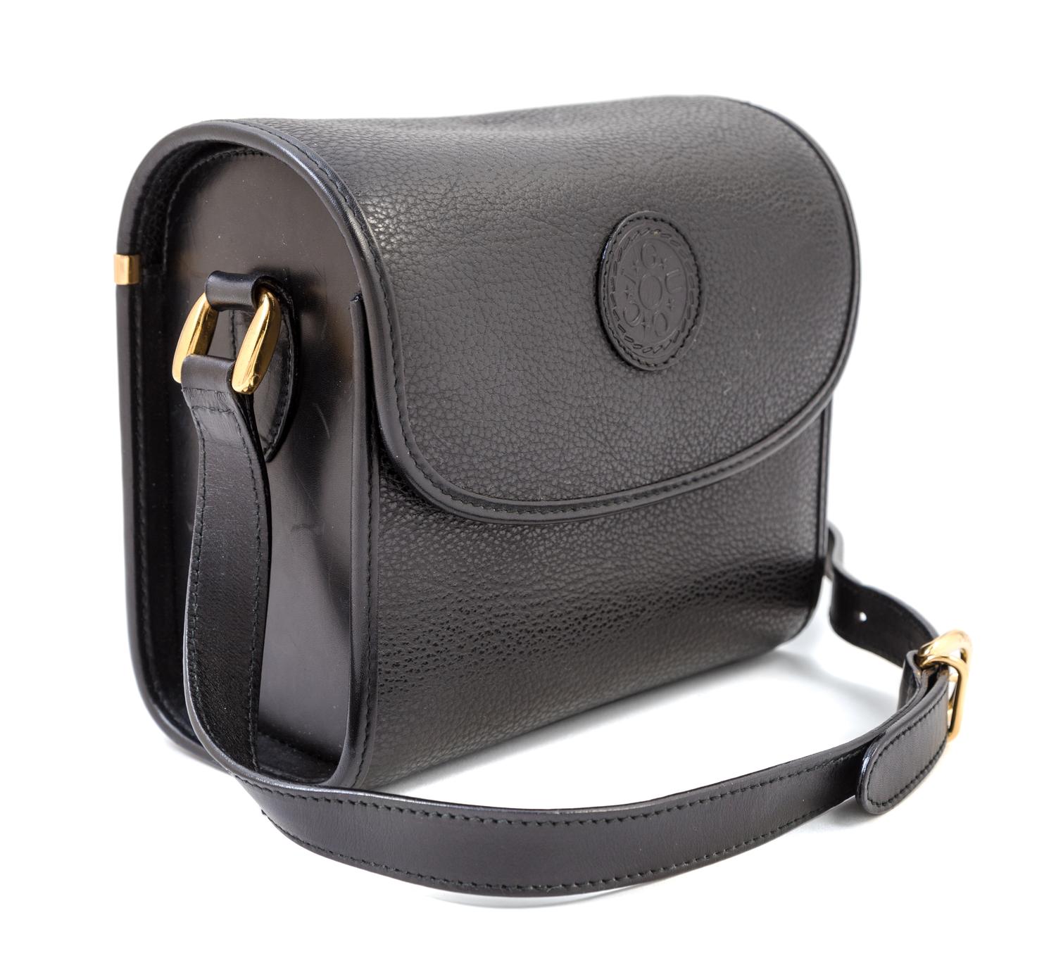 A Gucci Black Leather Camera Bag, 7" x 6" x 4"; Strap drop: 23".