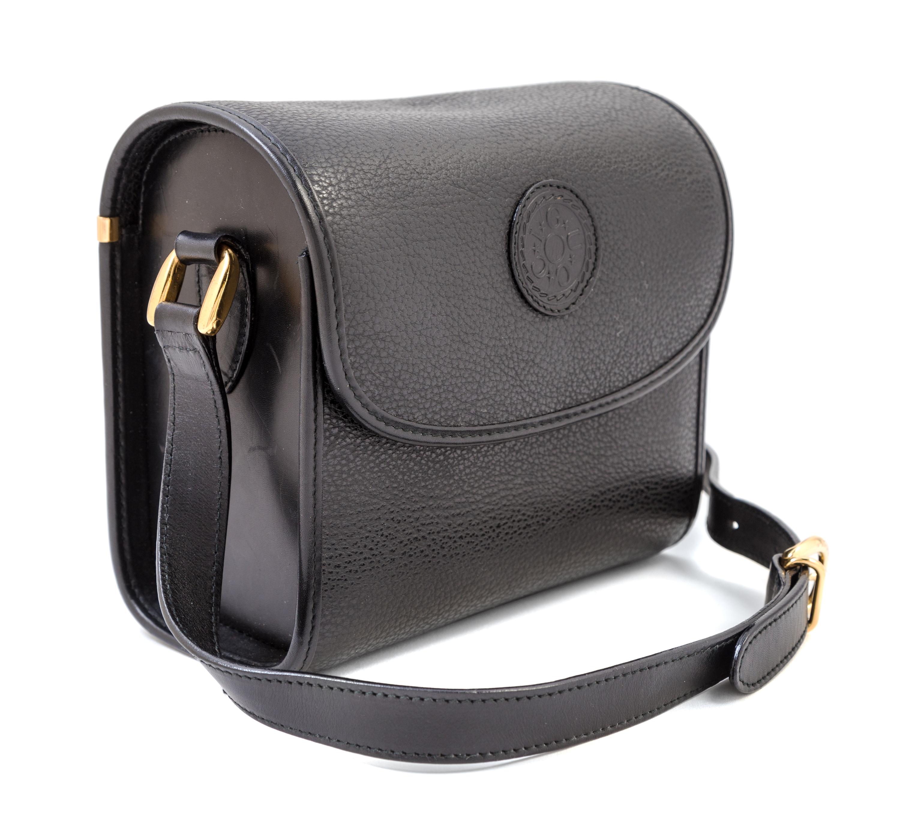 A Gucci Black Leather Camera Bag, 7" x 6" x 4"; Strap drop: 23".