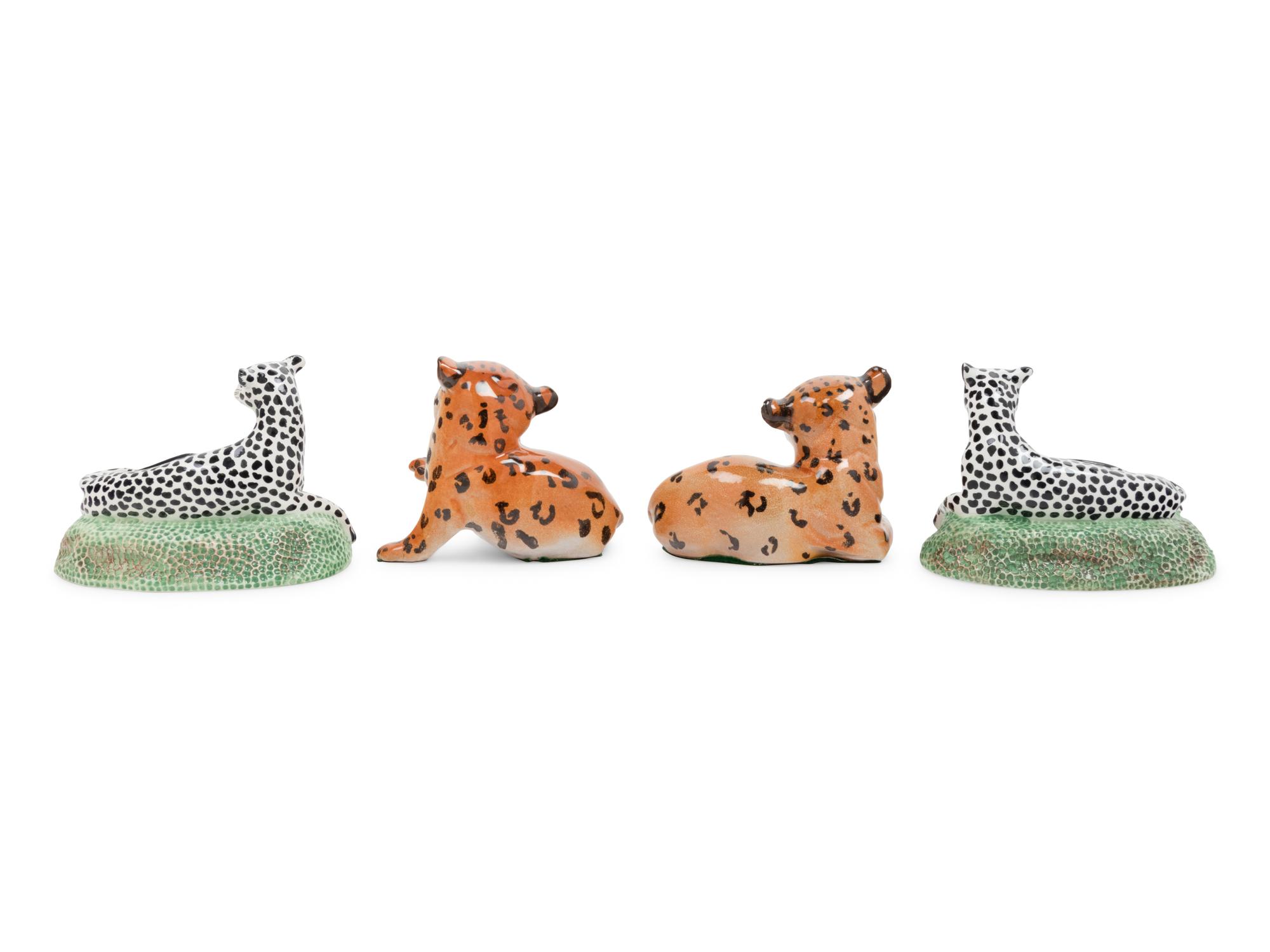 A Pair of Italian Faience Cheetah Cubs and a Pair of Mottahedeh Cats