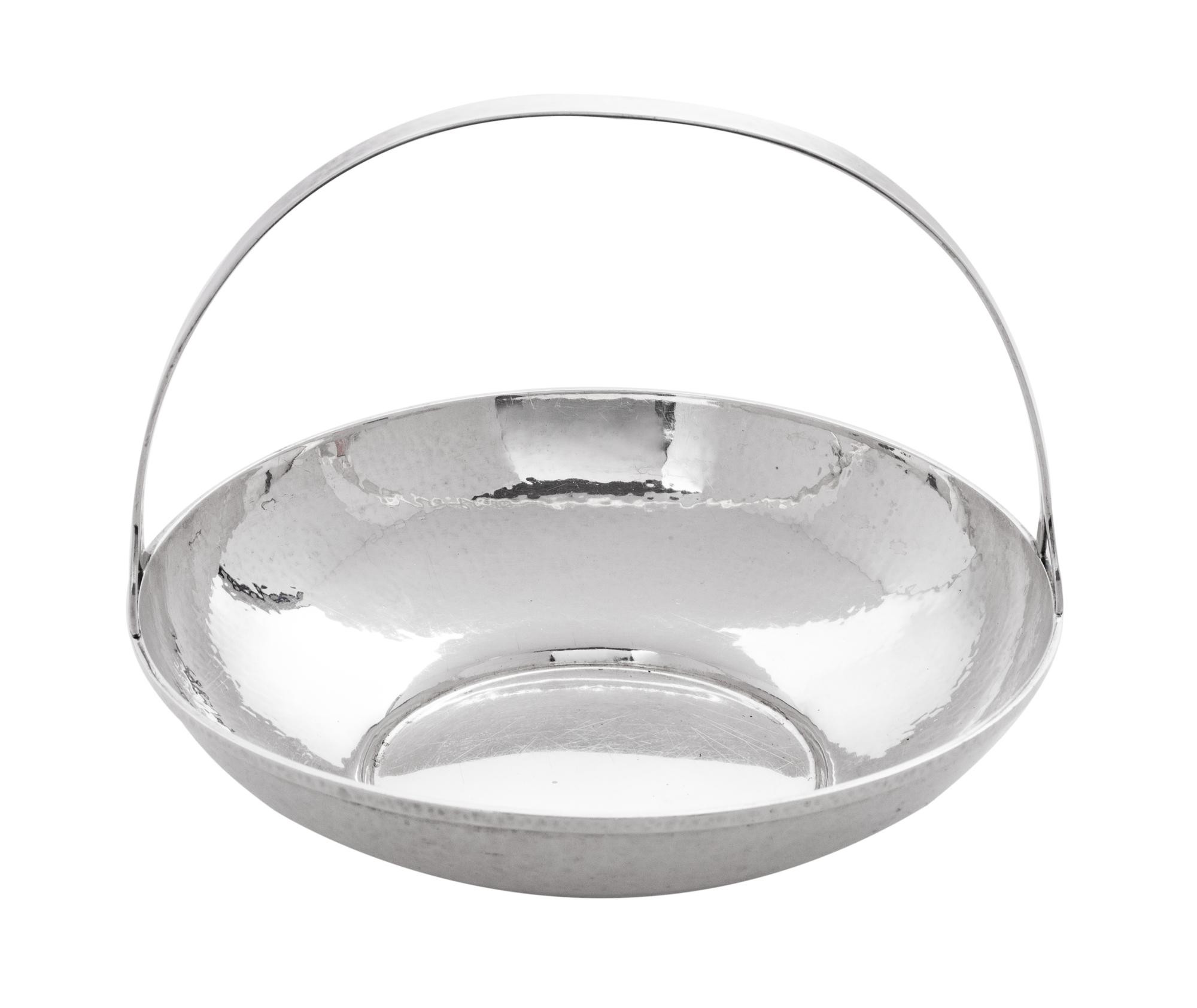 An American Silver Handled Basket, Lebolt & Co., Chicago, IL, with hammered surface and applied monogram.