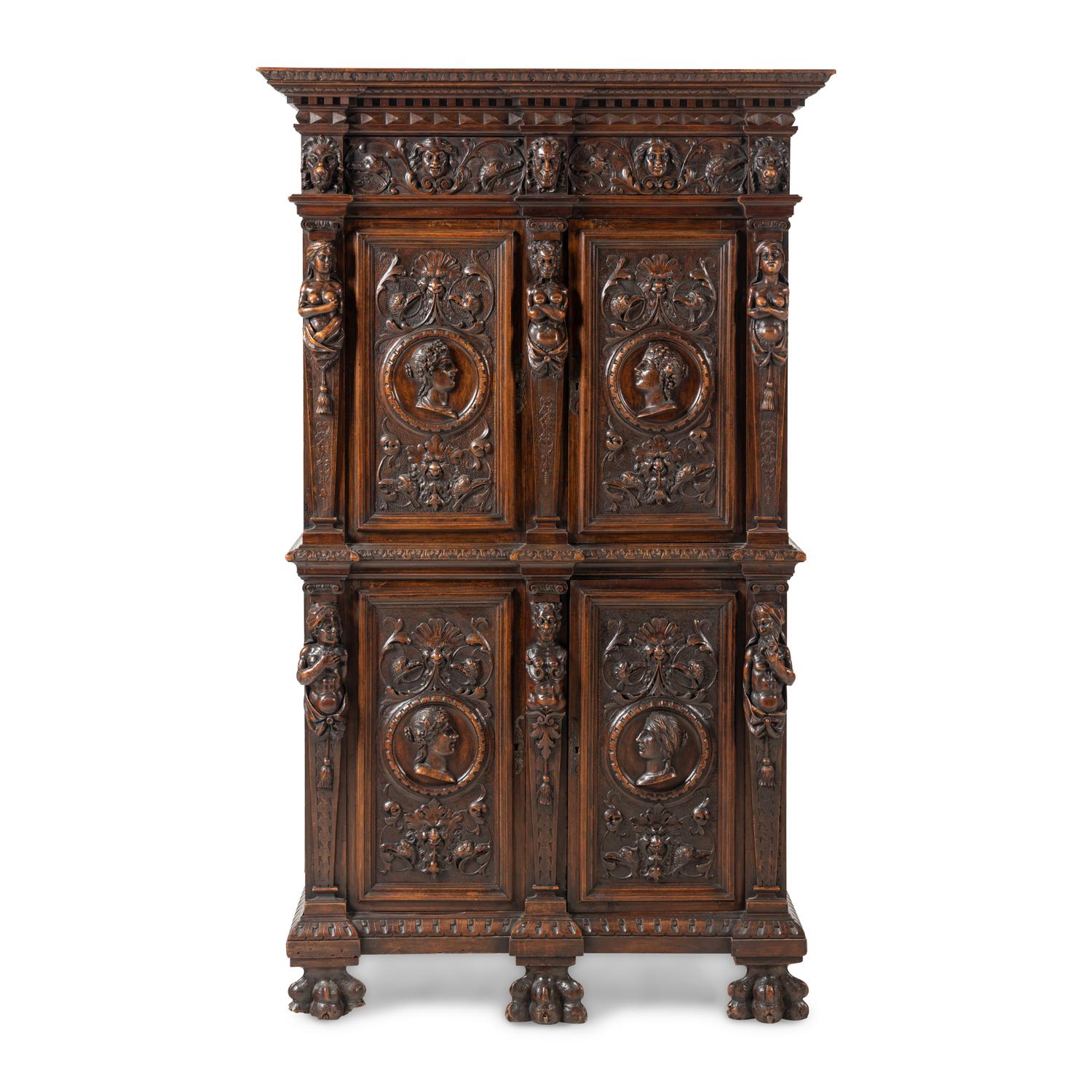 An Italian Renaissance Style Carved Walnut Cabinet