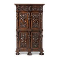 An Italian Renaissance Style Carved Walnut Cabinet