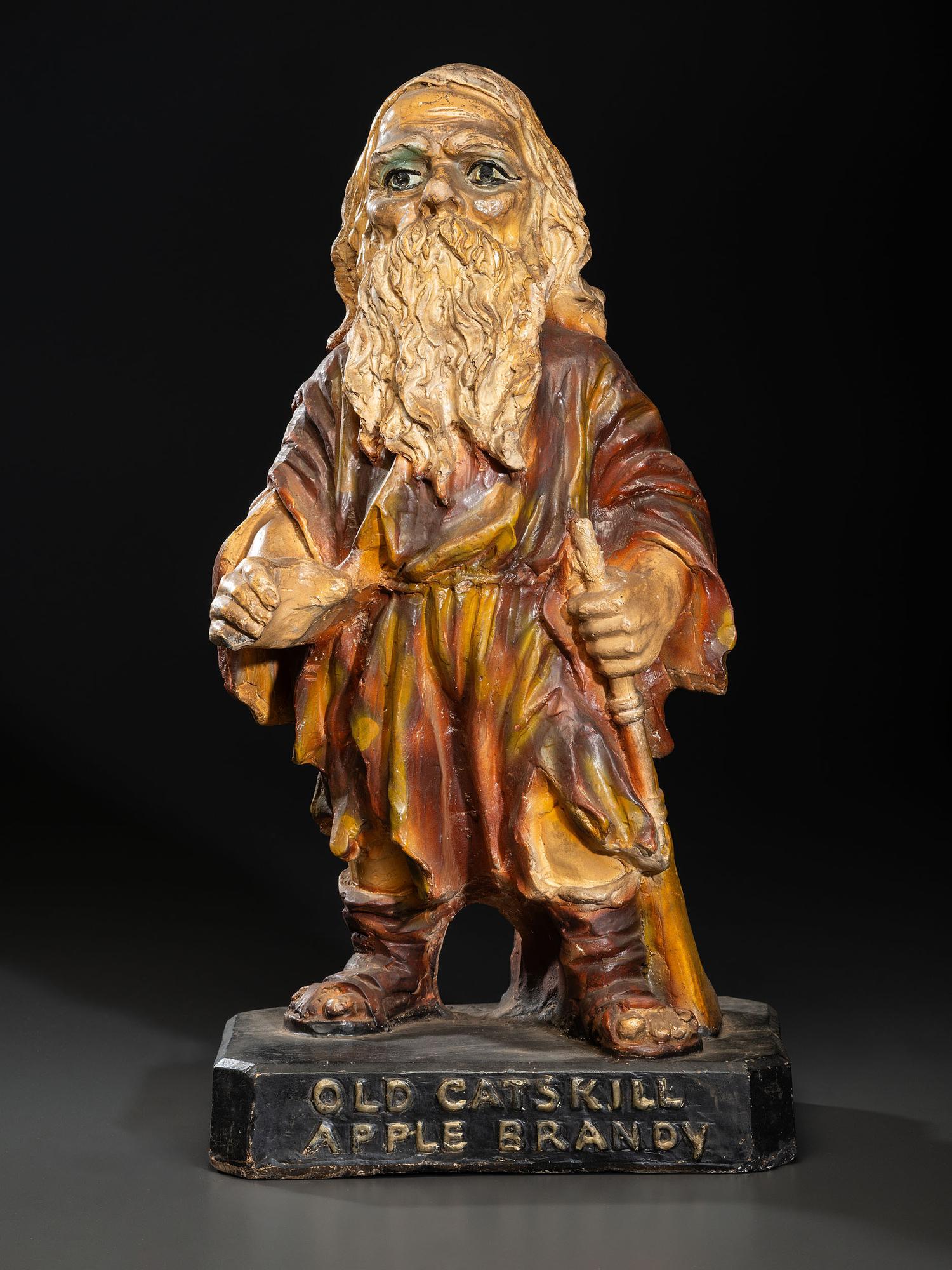 An 'Old Catskill' Apple Brandy Painted Chalkware Countertop Advertising Figure