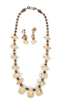 Two Single Strand Carved Fossil Fetish Necklaces, Robert Kaniatobe (1936-1998) Length of each 26 inches.