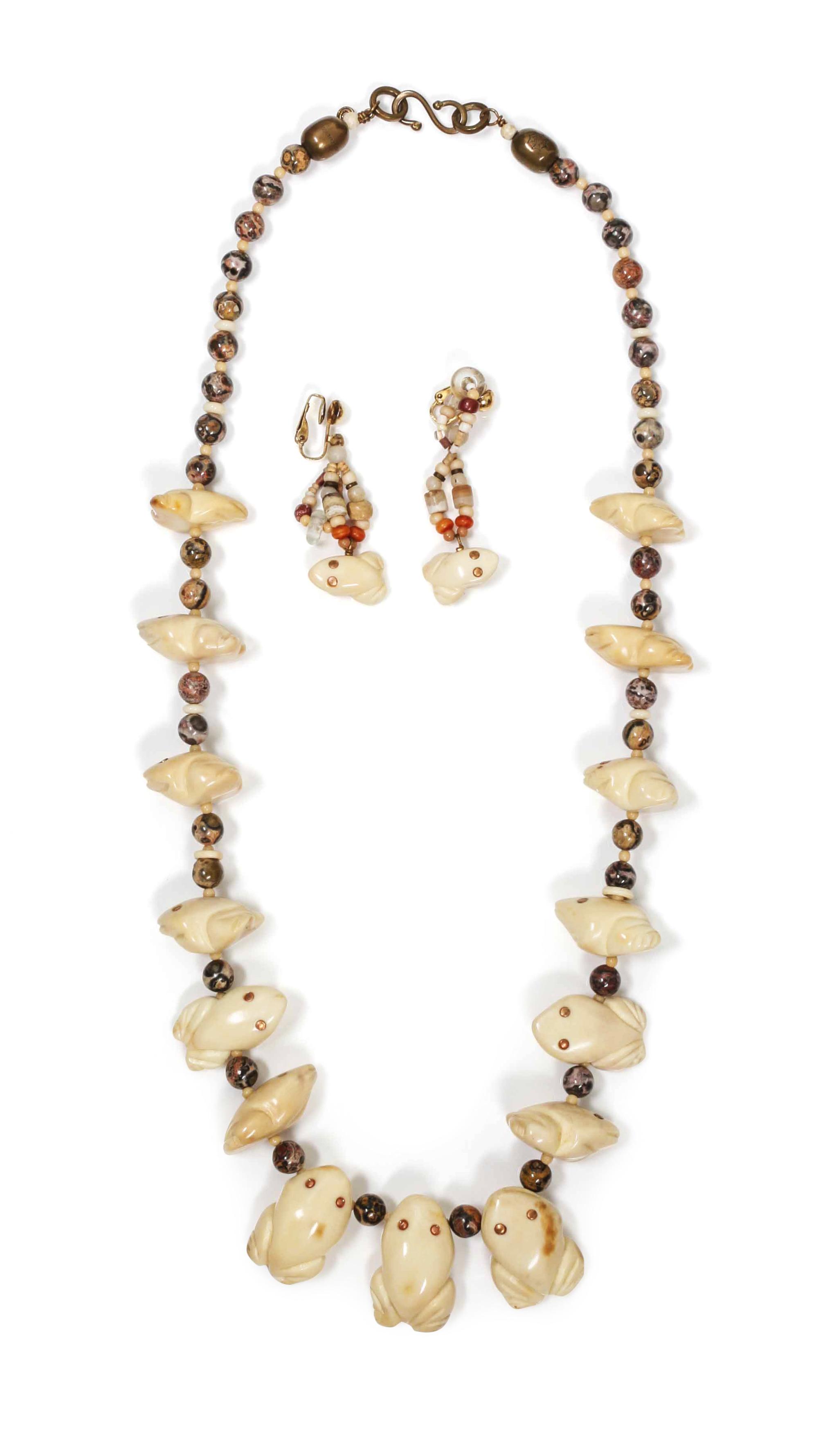 Two Single Strand Carved Fossil Fetish Necklaces, Robert Kaniatobe (1936-1998) Length of each 26 inches.