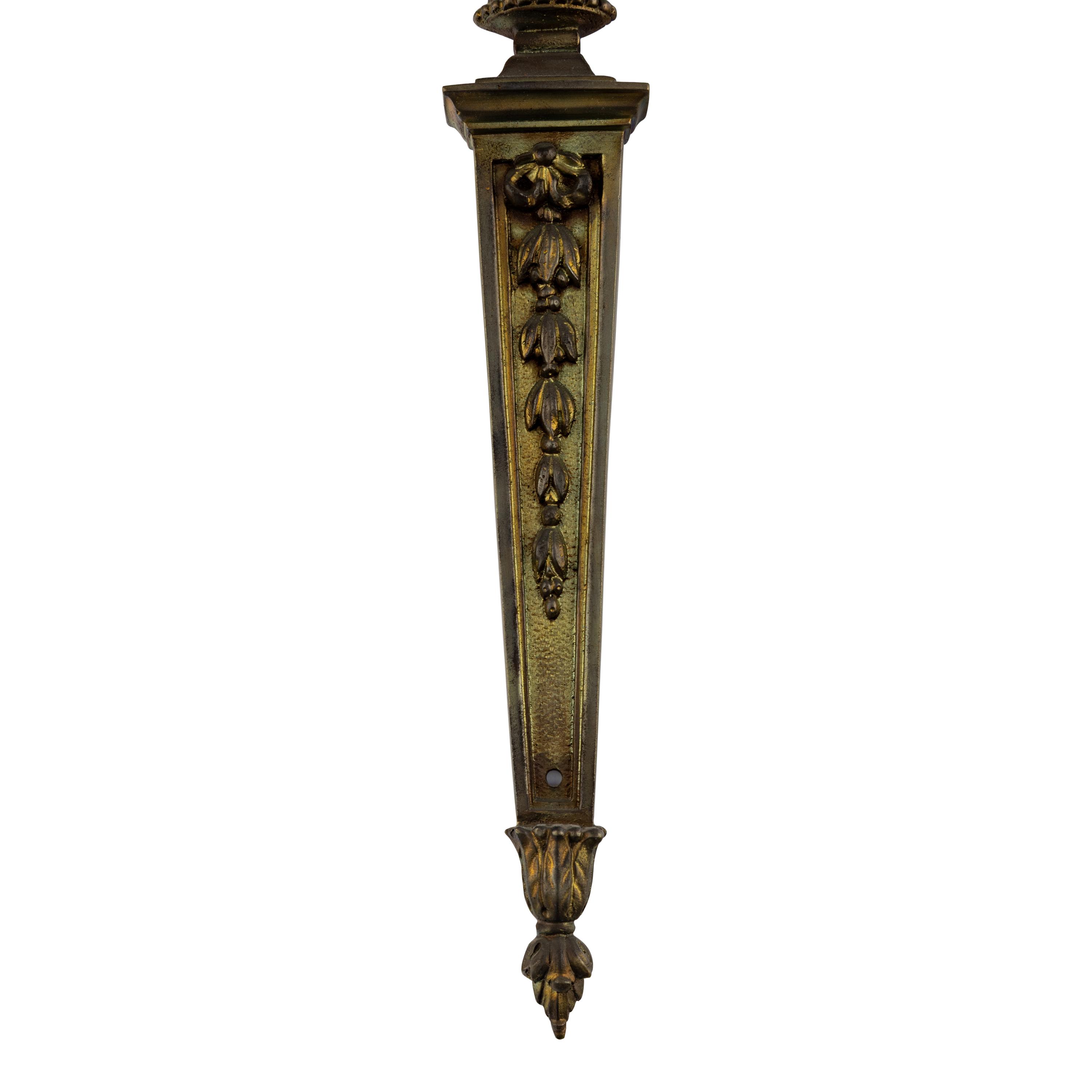 A Pair of Louis XVI Style Bronze Three-Light Sconces