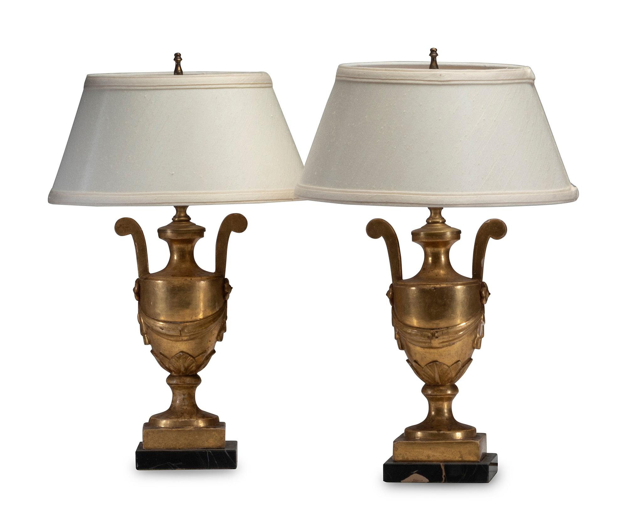 A Pair of Continental Giltwood Urns
