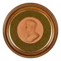 A Terra Cotta Portrait Medallion of Benjamin Franklin