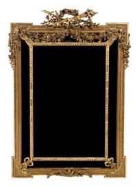 A Louis XVI Style Giltwood Mirror, Height 62 1/2 x width 41 1/2 inches.