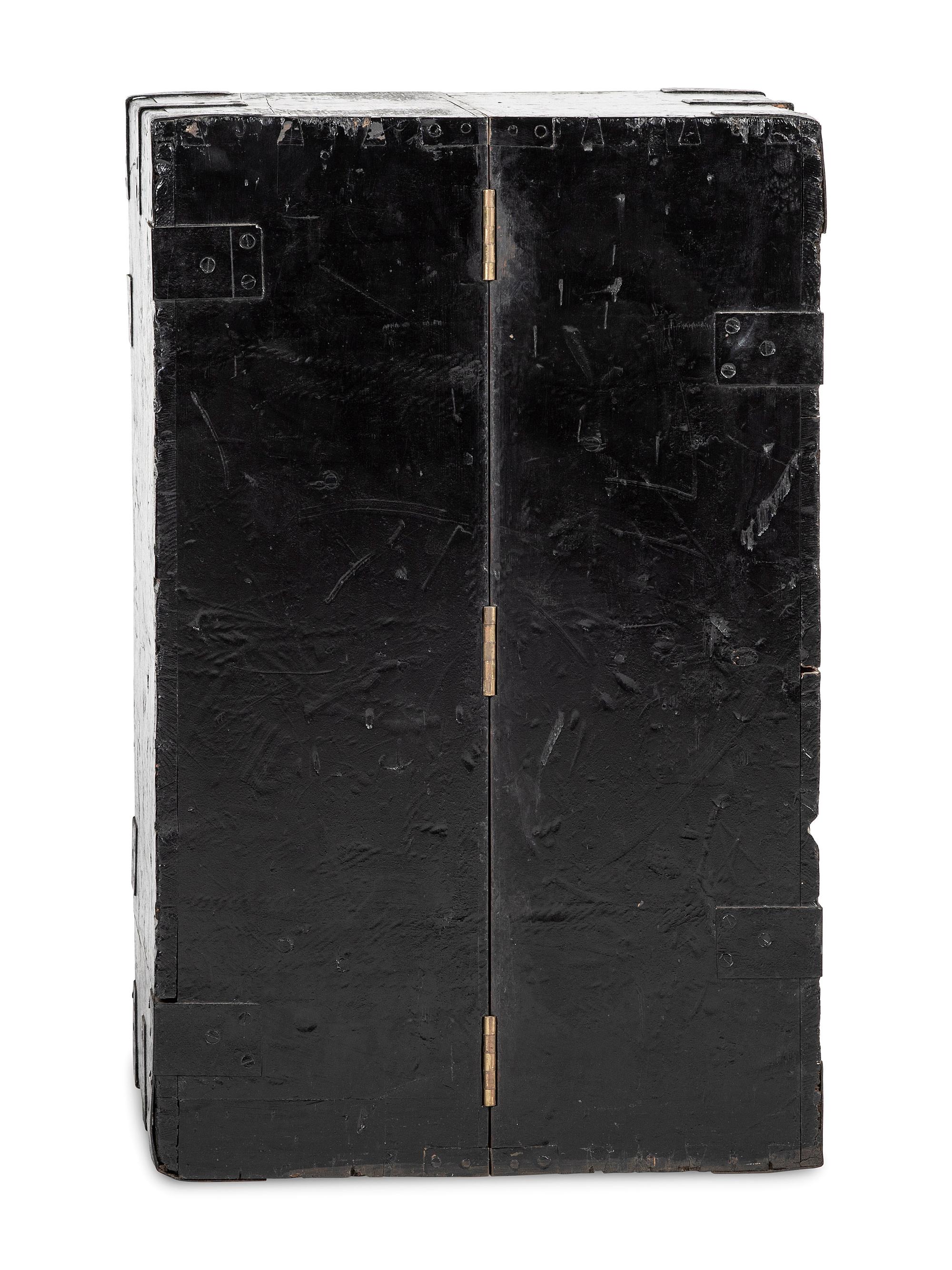 An English Black Brass and Iron Mounted, Painted Pine and Figured Mahogany Storage Chest