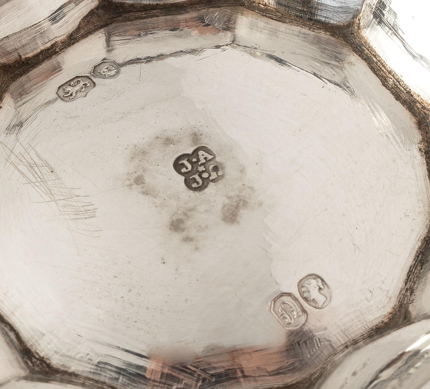 A Victorian Silver Four-Piece Coffee and Tea Service