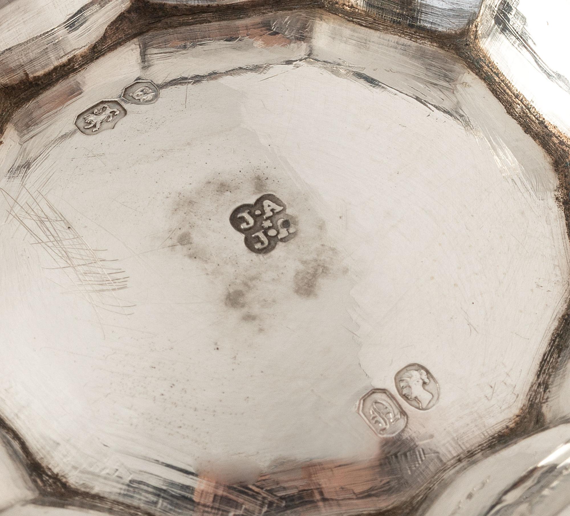 A Victorian Silver Four-Piece Coffee and Tea Service