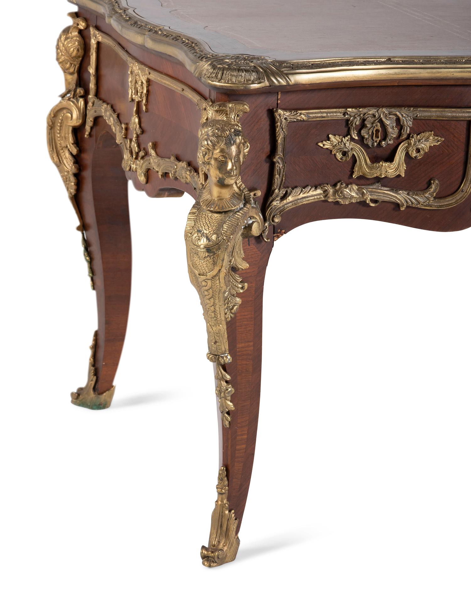 A Louis XV Style Gilt Bronze Mounted Mahogany Bureau Plat