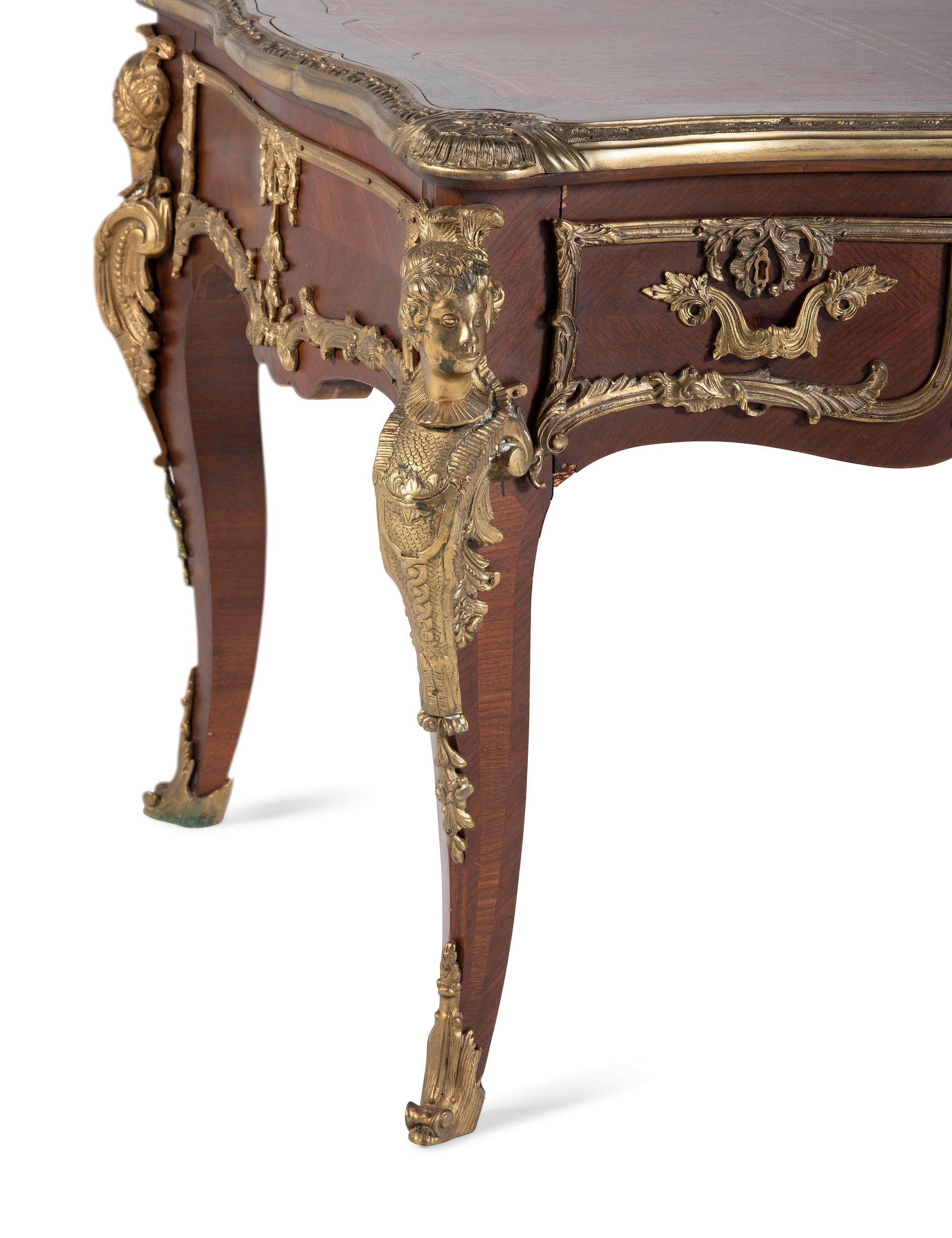 A Louis XV Style Gilt Bronze Mounted Mahogany Bureau Plat
