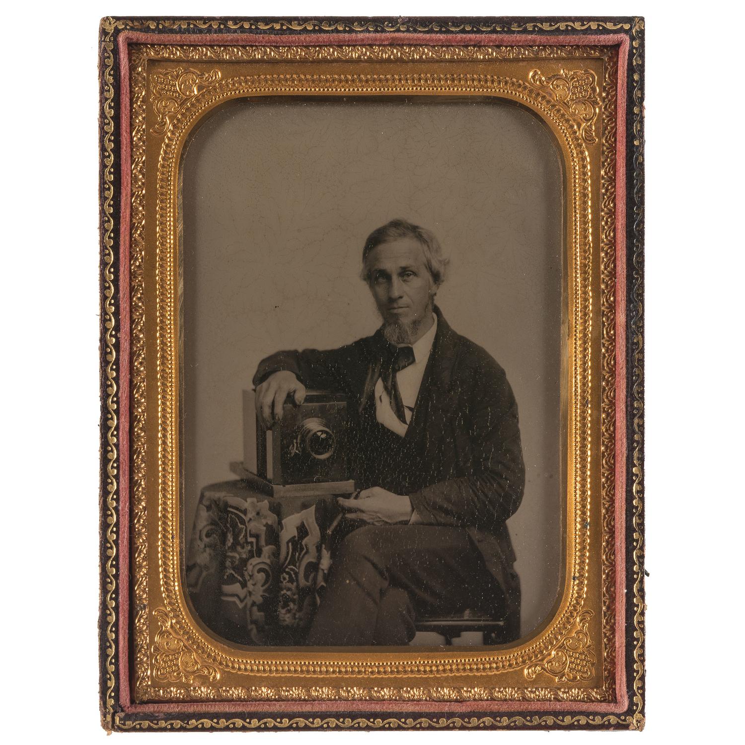 Occupational Half Plate Ambrotype of Photographer Posed with his Daguerreotype Camera