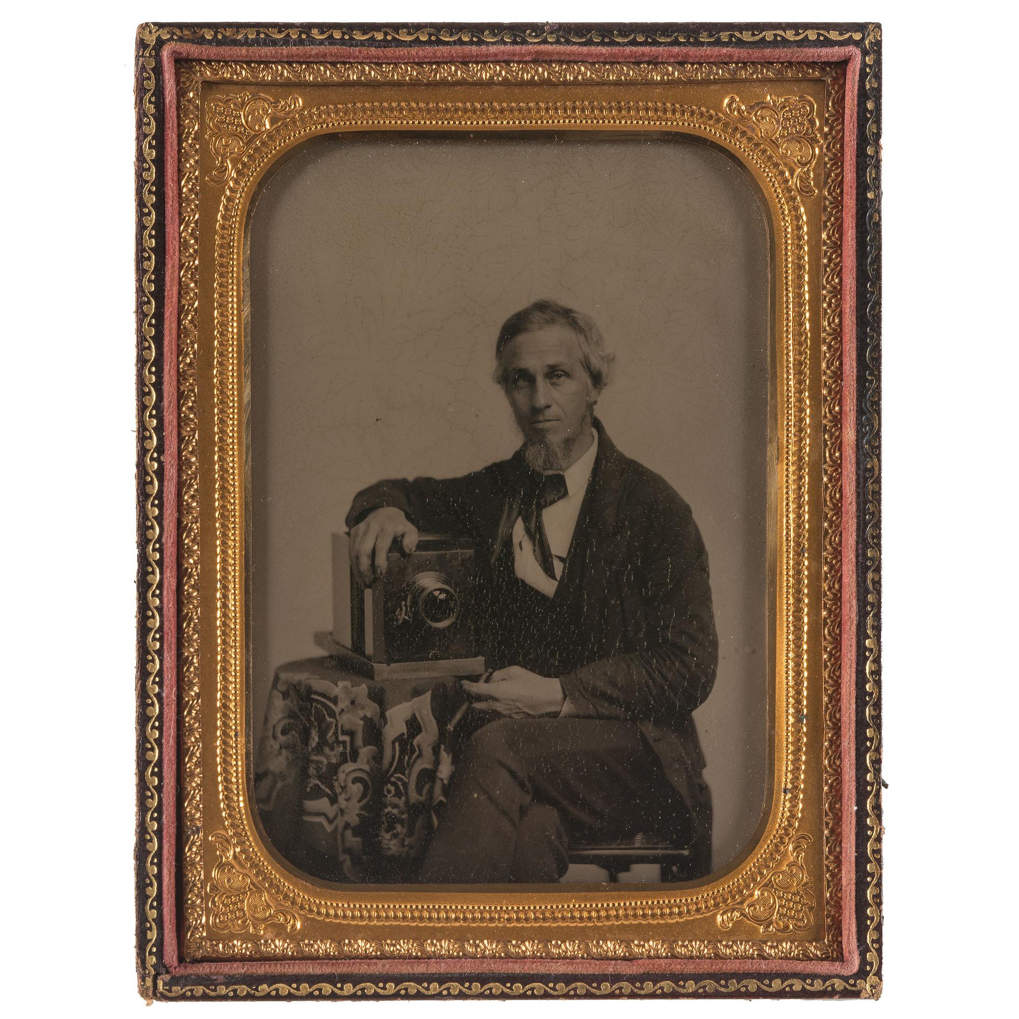 Occupational Half Plate Ambrotype of Photographer Posed with his Daguerreotype Camera