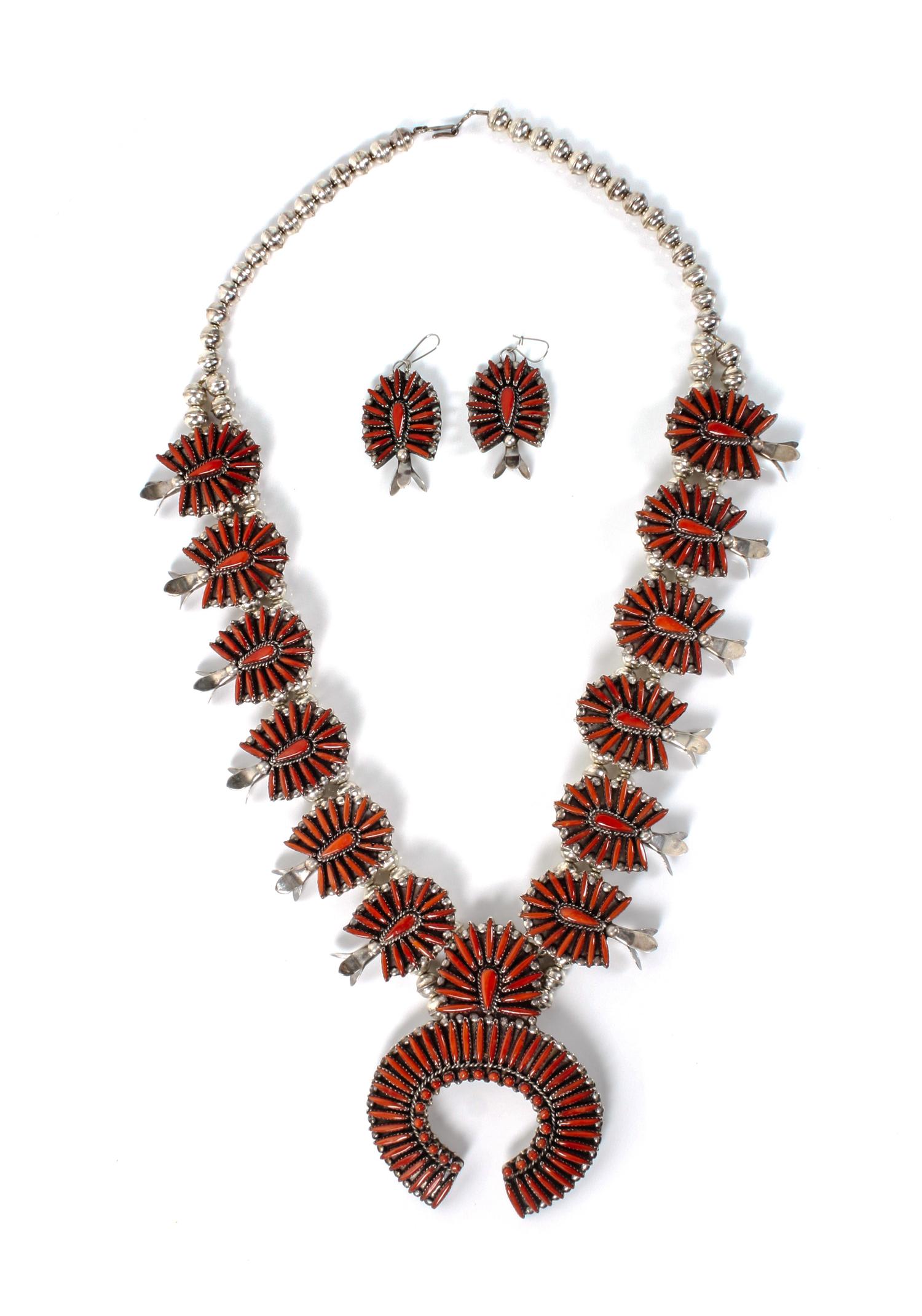 A Zuni Needlepoint Silver and Coral Squash Blossom Necklace and Earrings, Jane L. Peynetsa Length 27 inches; naja height 3 3/4 x width