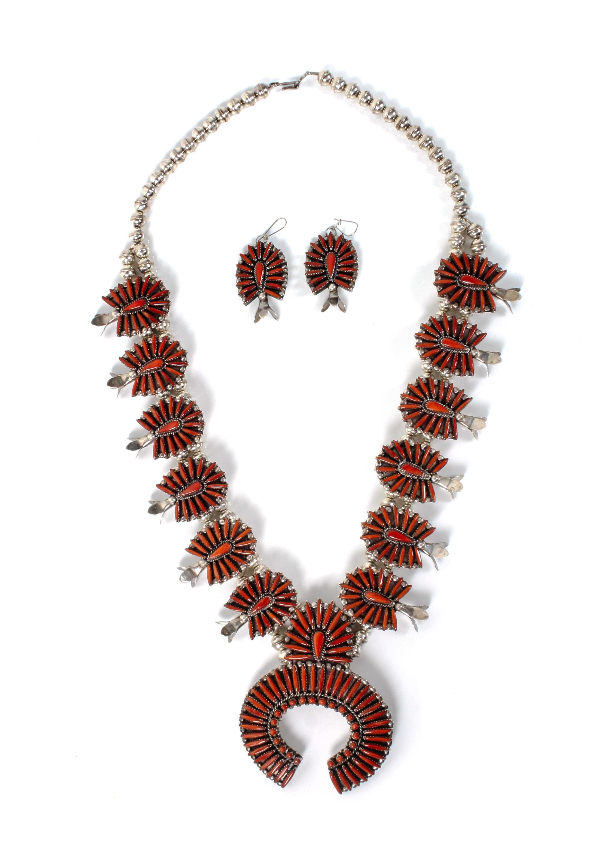 A Zuni Needlepoint Silver and Coral Squash Blossom Necklace and Earrings, Jane L. Peynetsa Length 27 inches; naja height 3 3/4 x width