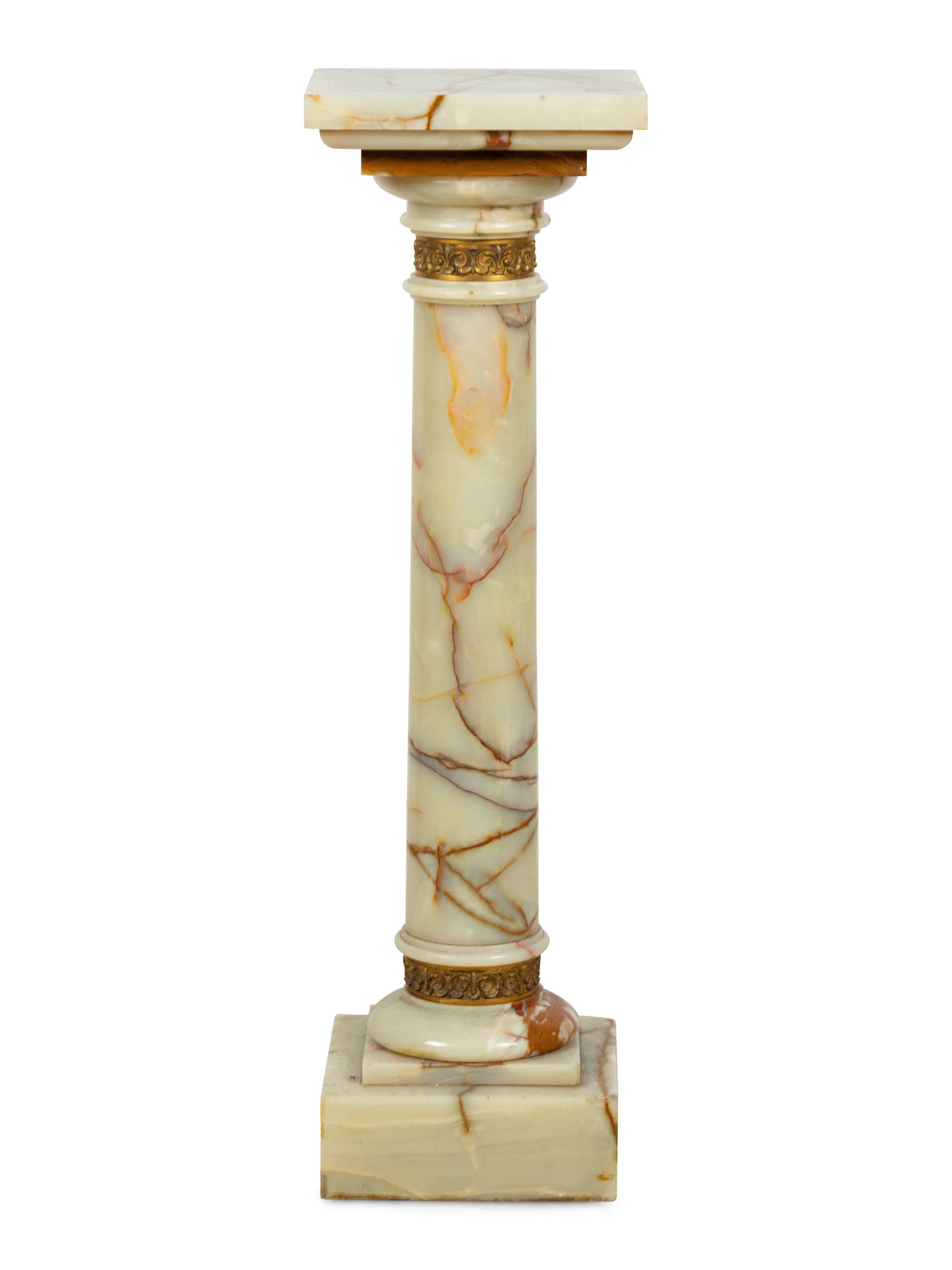 A Continental Gilt Bronze Mounted Onyx Pedestal