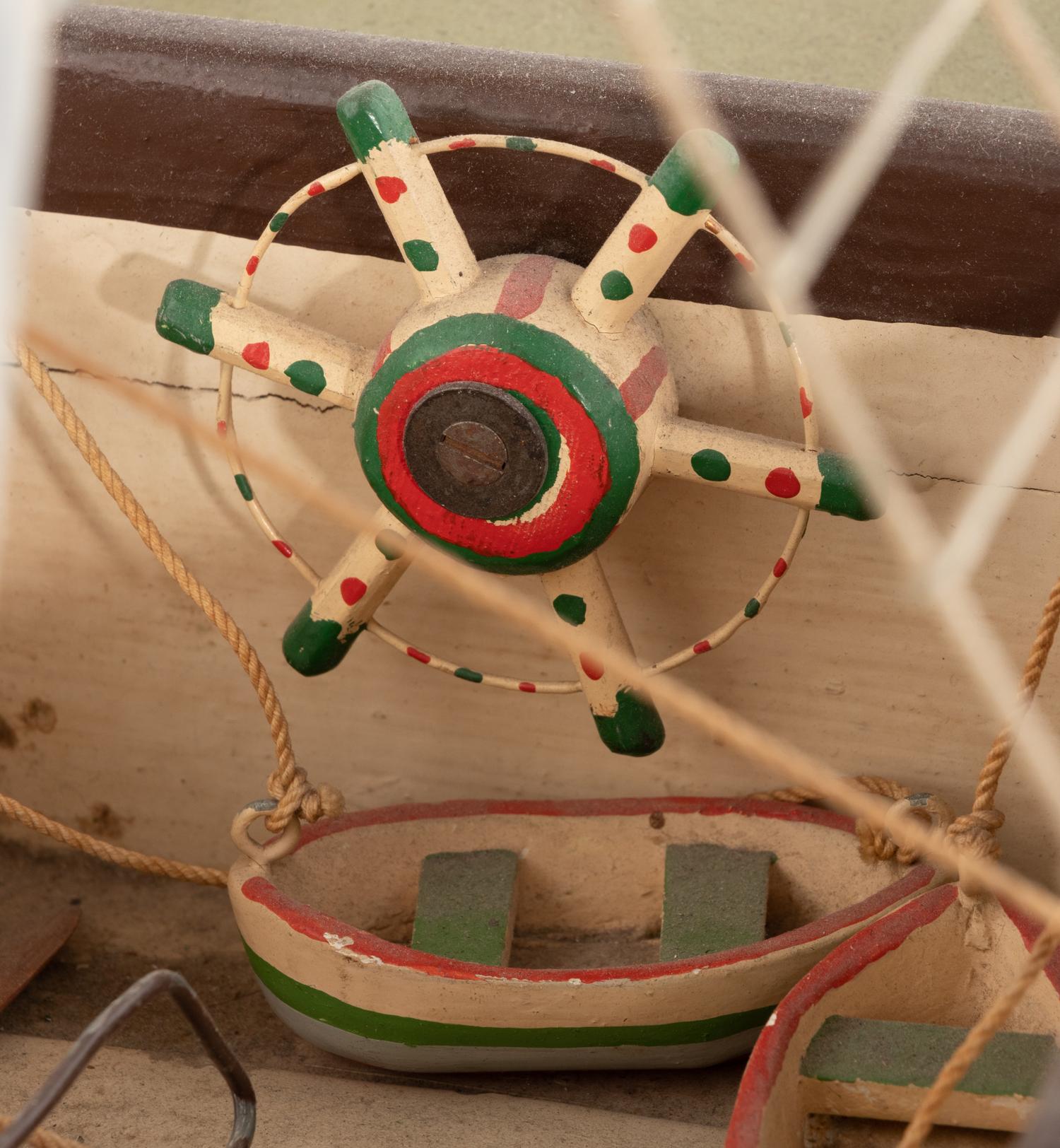A Carved and Polychrome Painted Wooden Ship Model