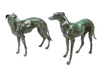 A Pair of Patinated Cast Metal Whippets Height 31 1/2 inches.