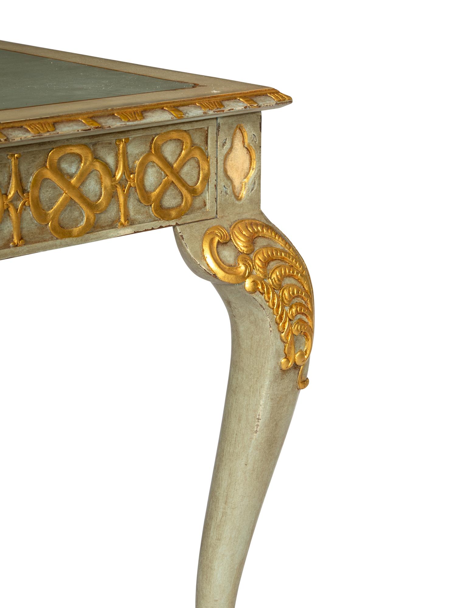 A Maitland-Smith Georgian Style Painted and Parcel Gilt Desk and Associated Louis XVI Style Chair