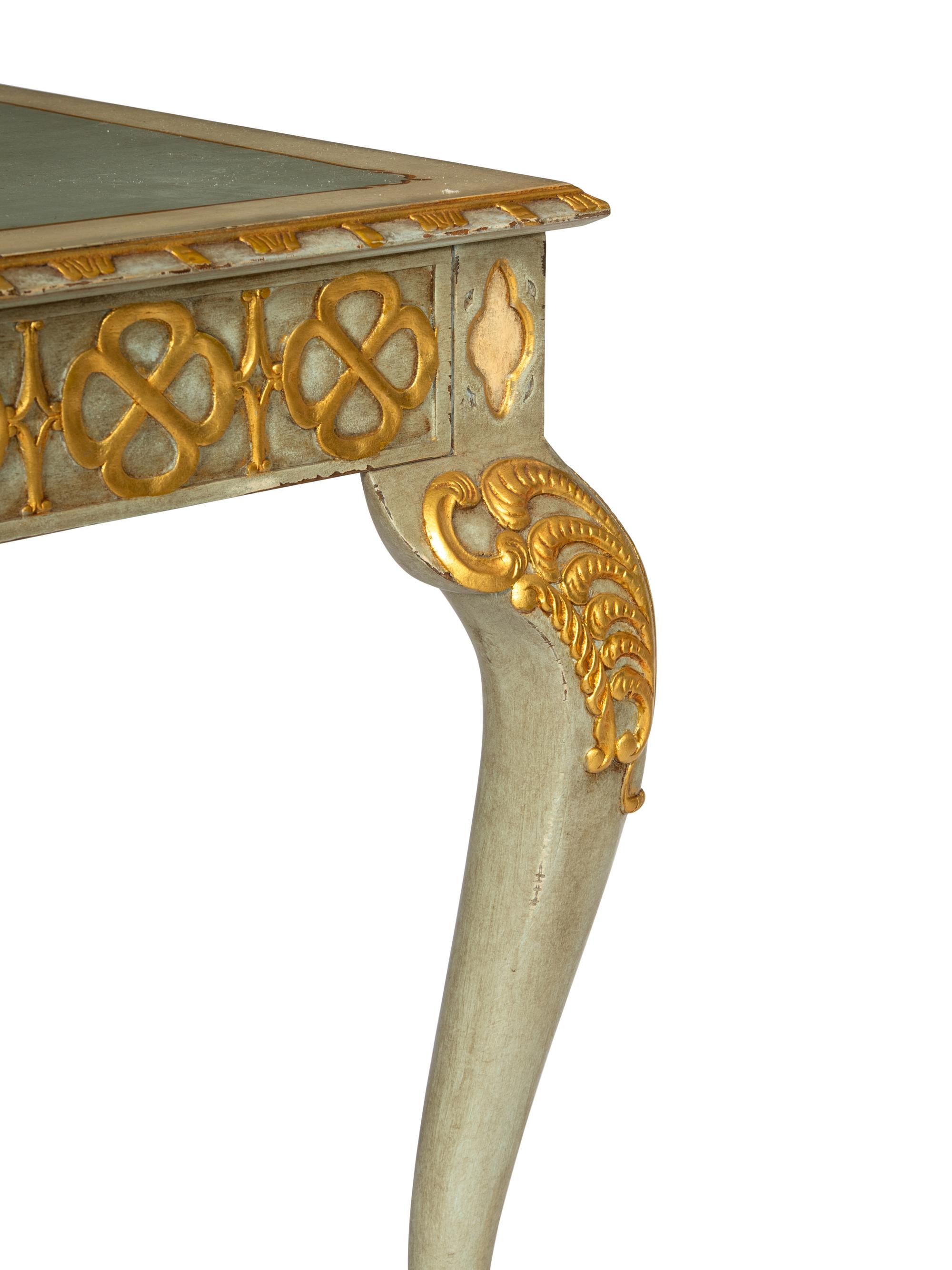 A Maitland-Smith Georgian Style Painted and Parcel Gilt Desk and Associated Louis XVI Style Chair