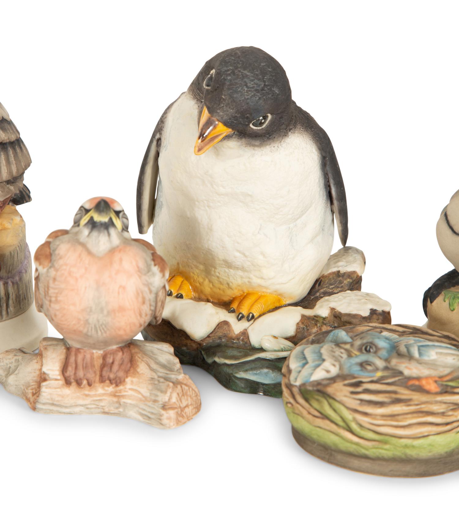 A Collection of Fourteen Porcelain Birds