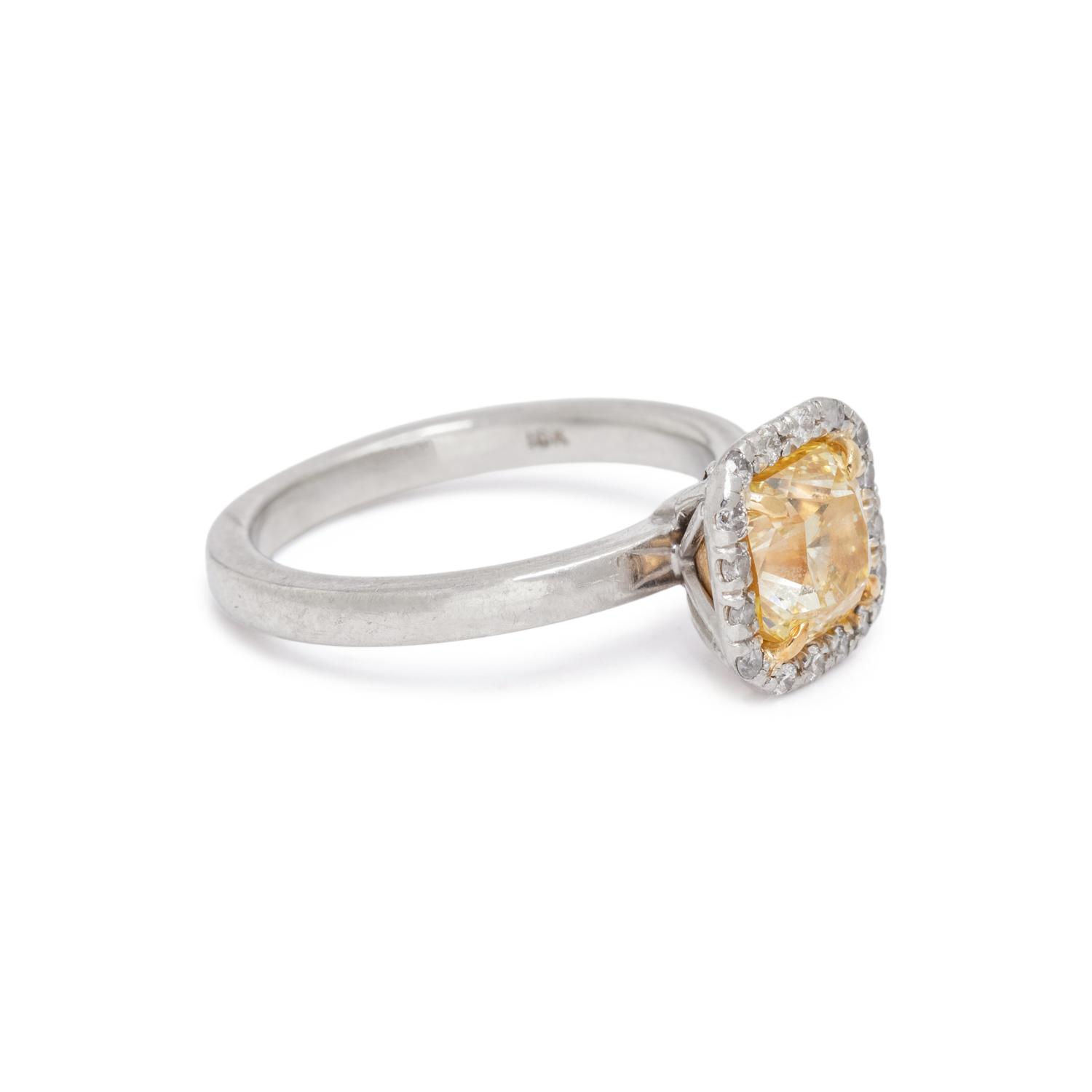 FANCY INTENSE YELLOW DIAMOND AND DIAMOND RING