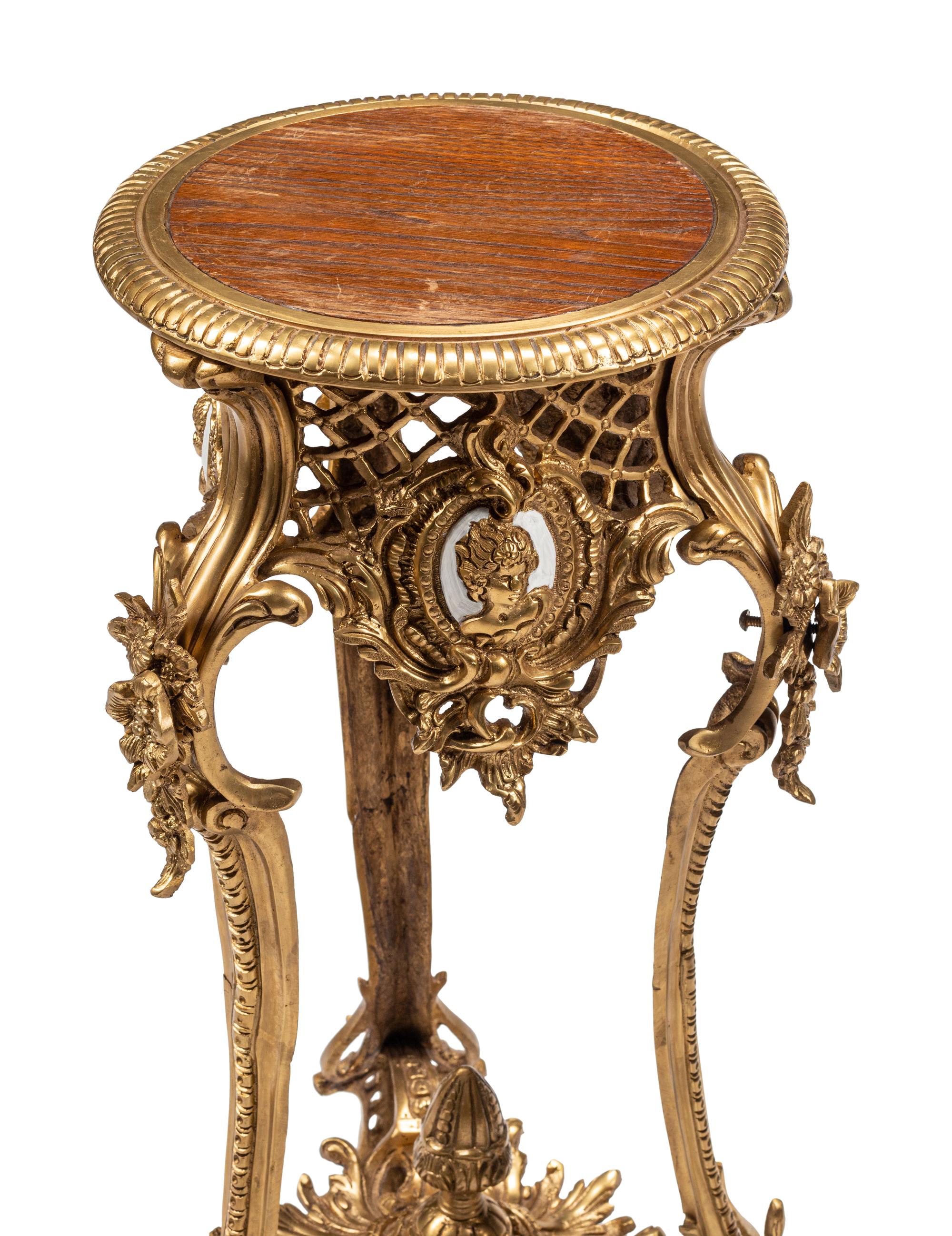 A Pair of Continental Gilt Bronze Stands