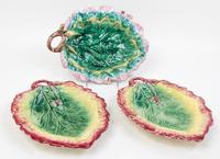 A Set of Three Majolica Leaf Form Dishes Width of largest 12 1/4 inches.