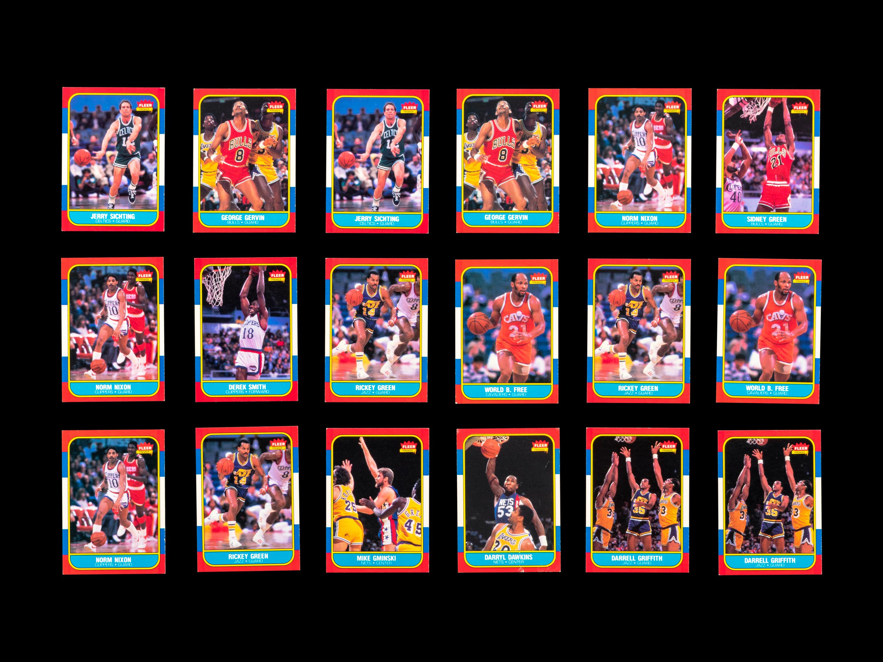 A Group of 71 1986 Fleer Basketball Cards and Stickers (Including Julius Erving, Patrick Ewing, Magic Johnson and Hakeem Olajuwon)