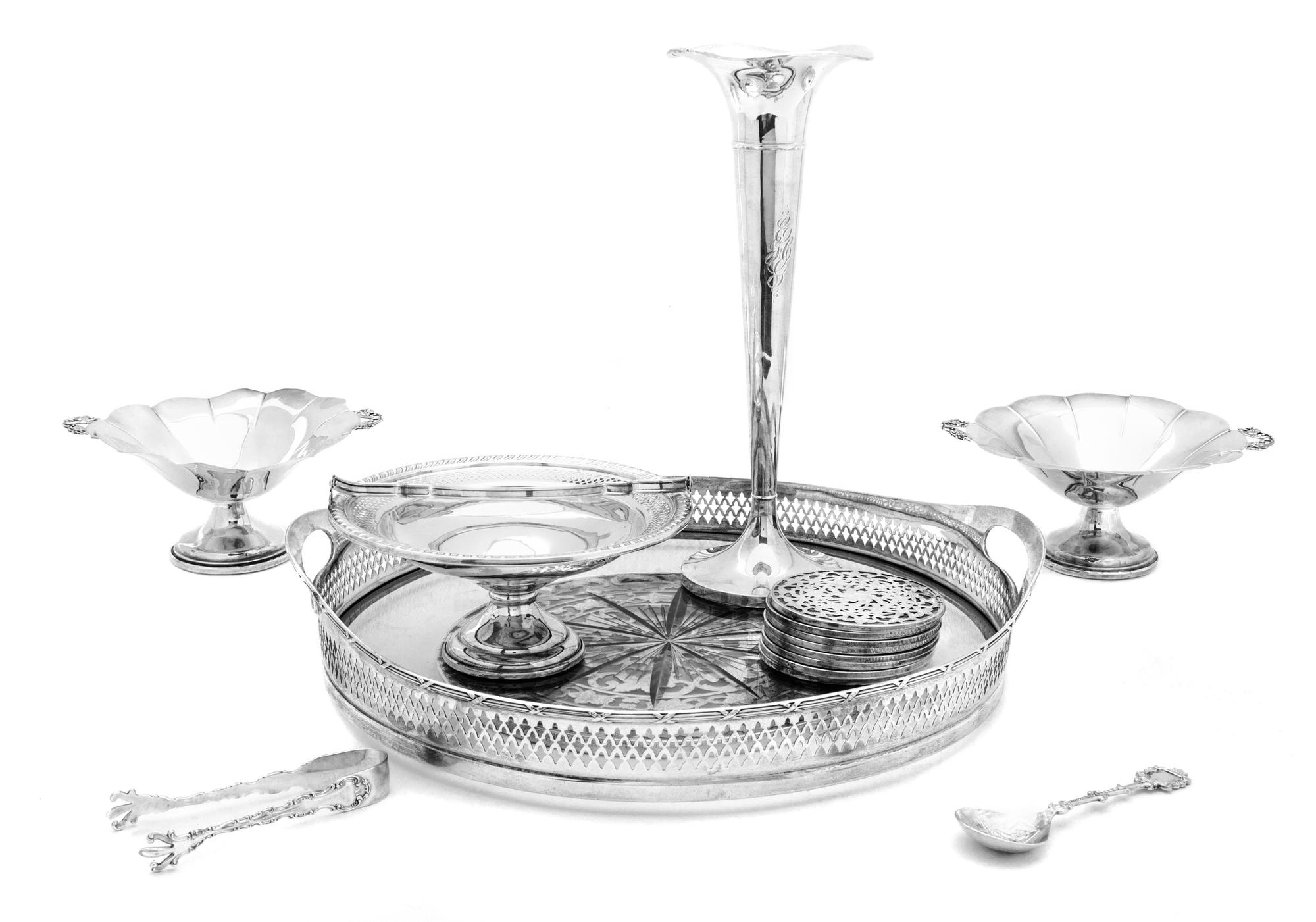 A Collection of American Silver Articles, Various Makers, comprising a weighted trumpet-form vase, a pair of weighted nut dishes, a wei