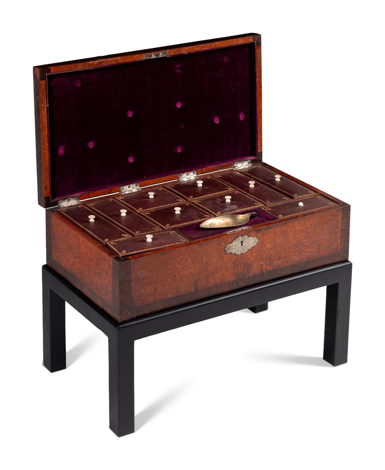 An English Rosewood and Burl Yew Wood Ten-Compartment Tea Caddy
