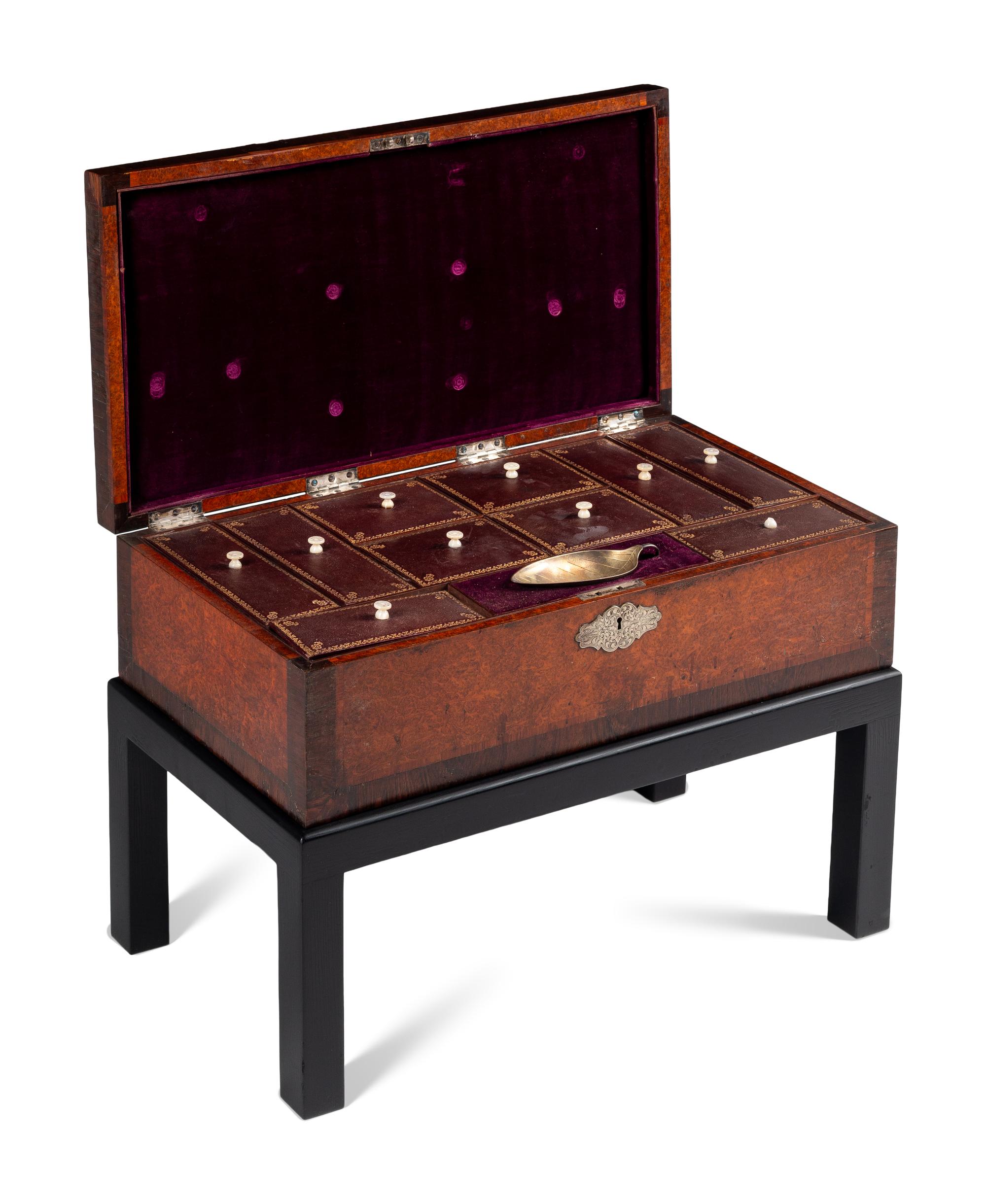 An English Rosewood and Burl Yew Wood Ten-Compartment Tea Caddy