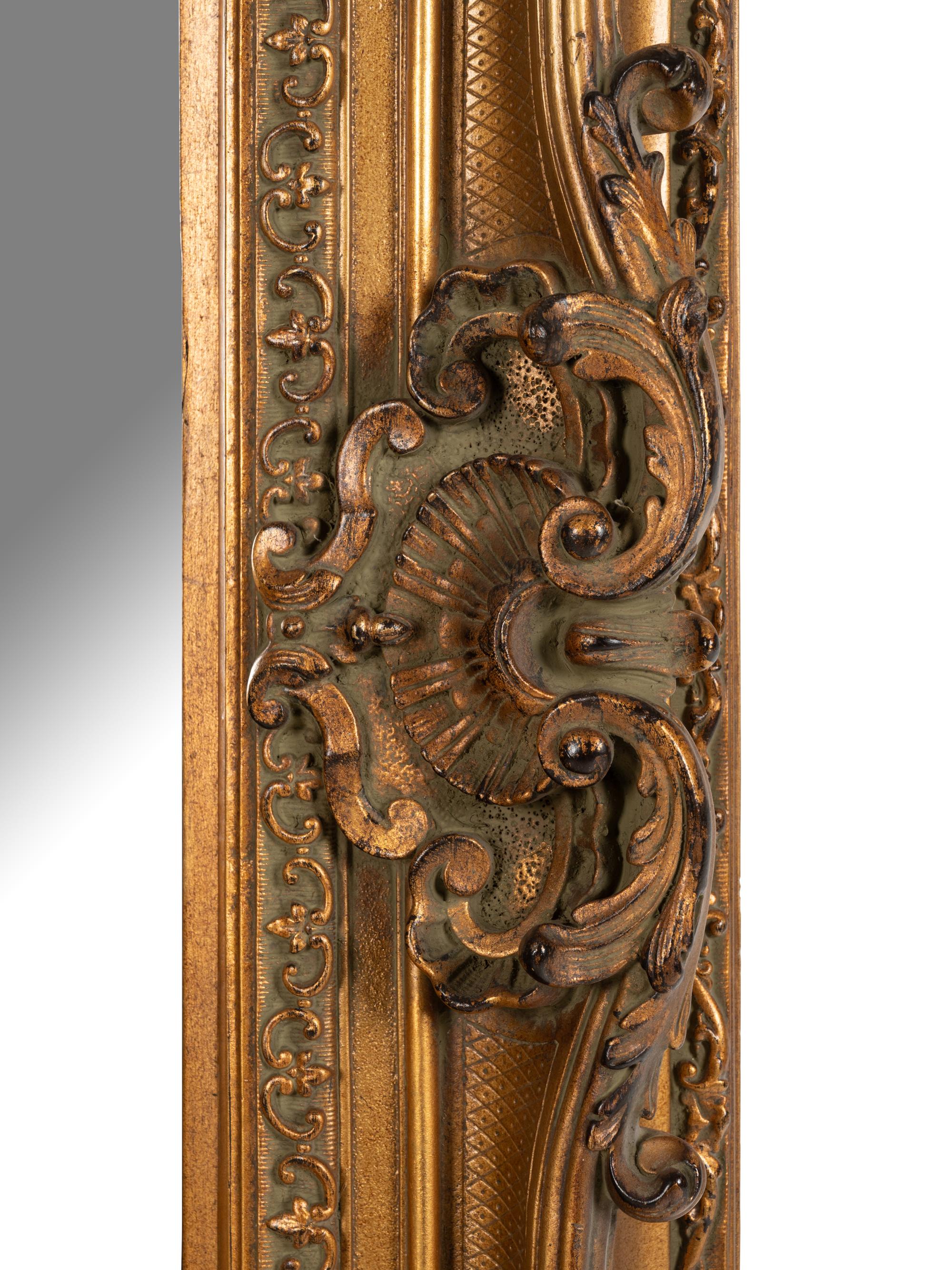 A Baroque Style Giltwood Mirror