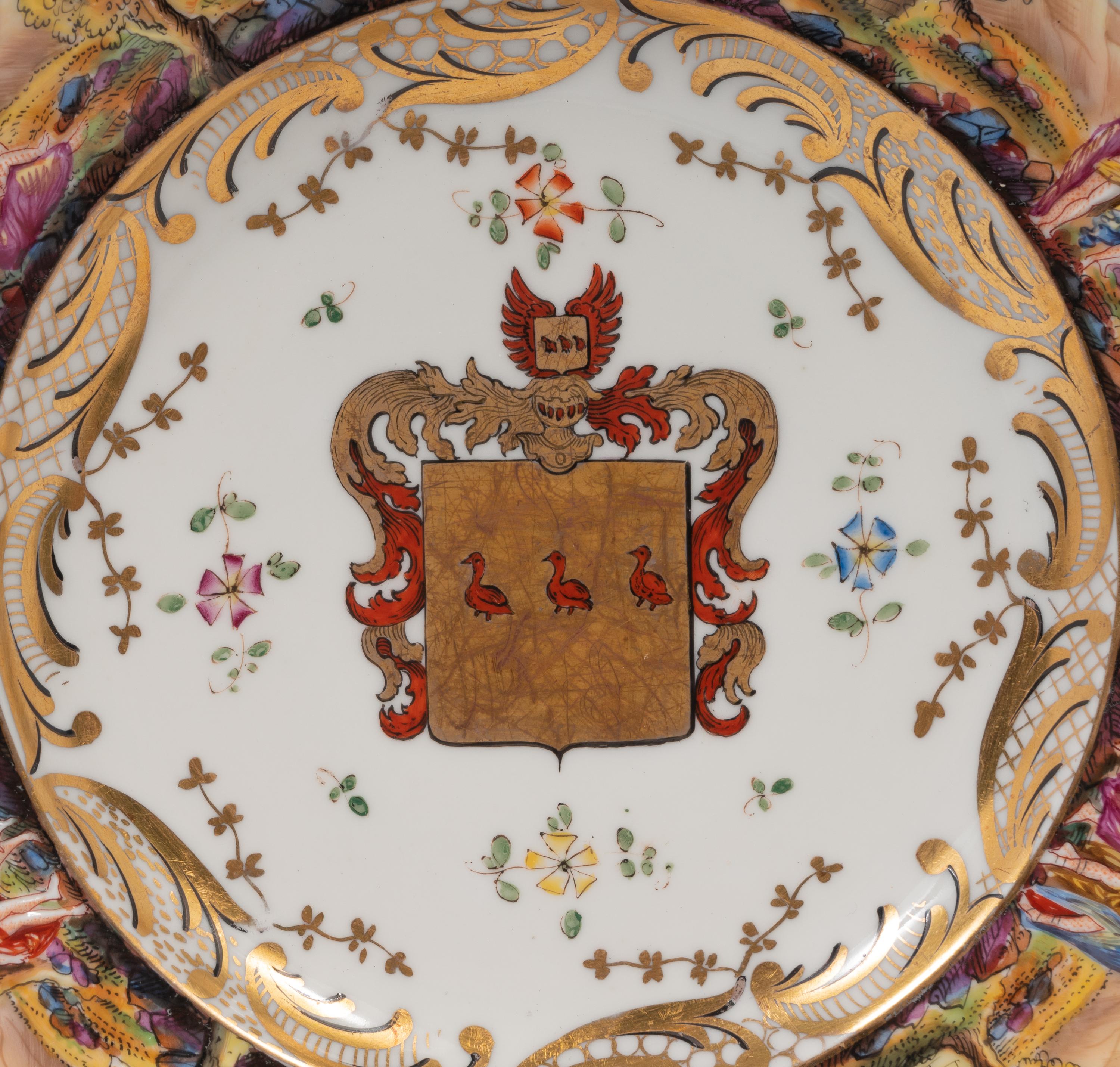 A Set of Twelve Capodimonte Armorial Porcelain Plates