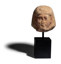 An Egyptian Painted Limestone Portrait Head of an Official