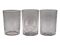 [SPANISH-AMERICAN WAR]. A group of milk glass, paperweights, glasses, and other souvenirs including items commemorating the Maine and Admiral Dewey, including:
