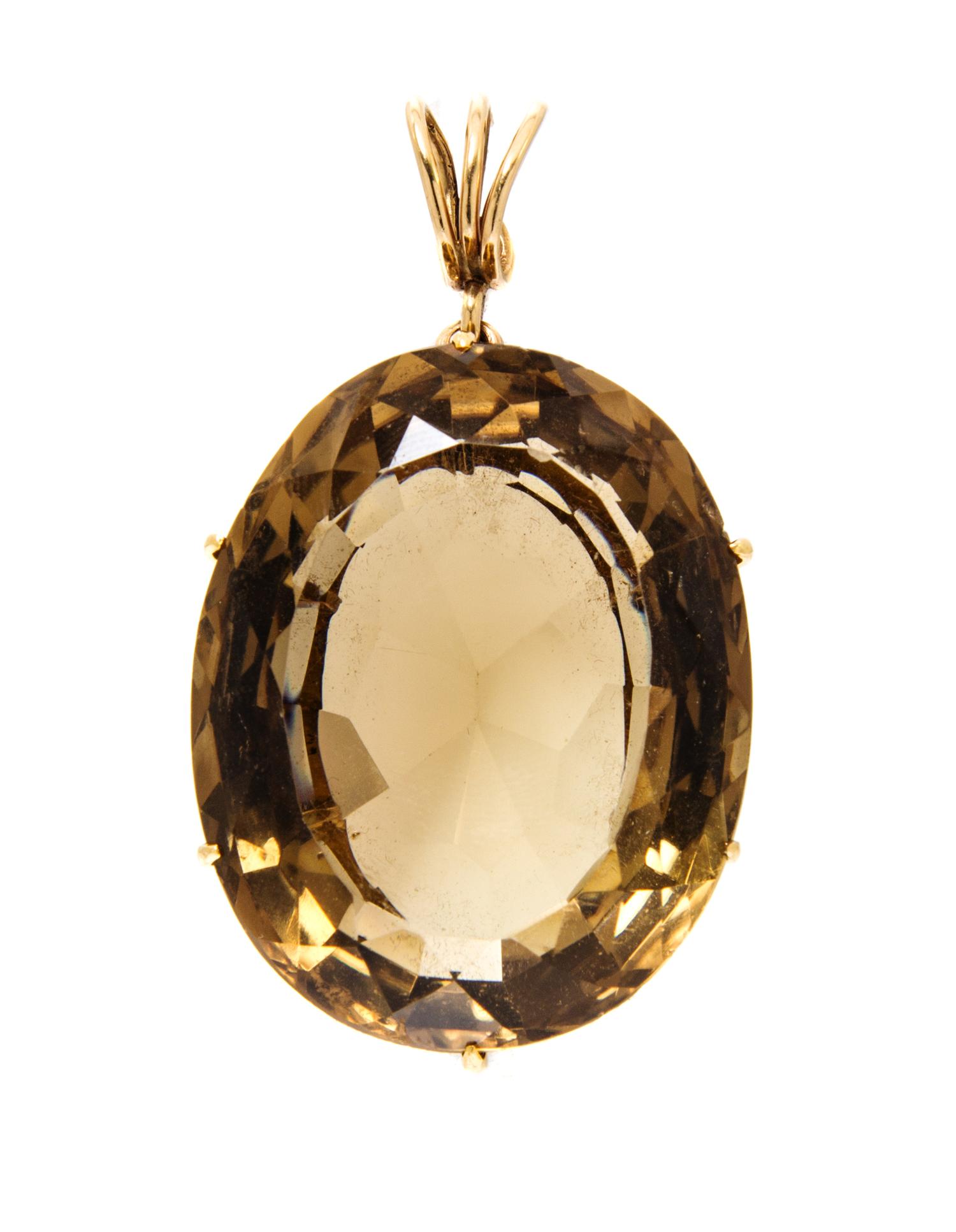 An 18 Karat Yellow Gold and Smokey Quartz Pendant, 27.50 dwts.