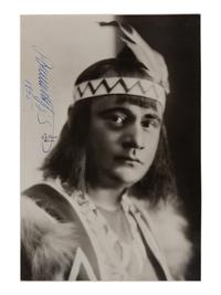 GIGLI, Beniamino (1890-1957). Black and white portrait photograph, signed (“Beniamino Gigli”), 1955.