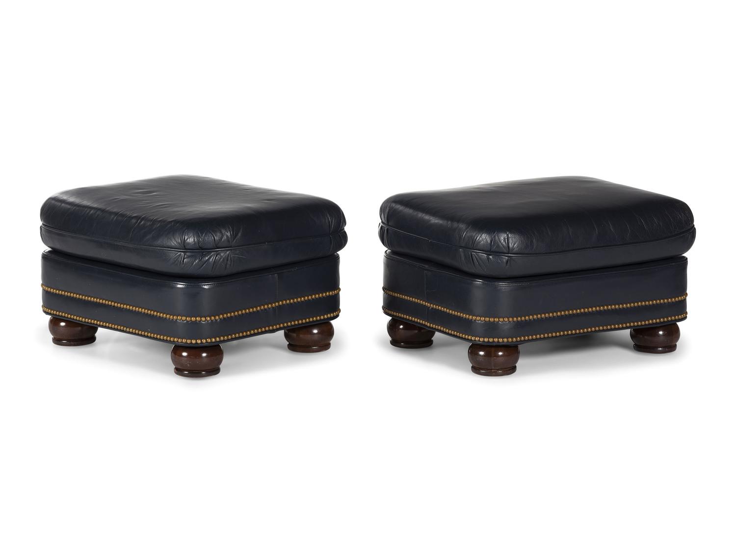 A Pair of Hancock and Moore Brass-Tacked Leather Chairs