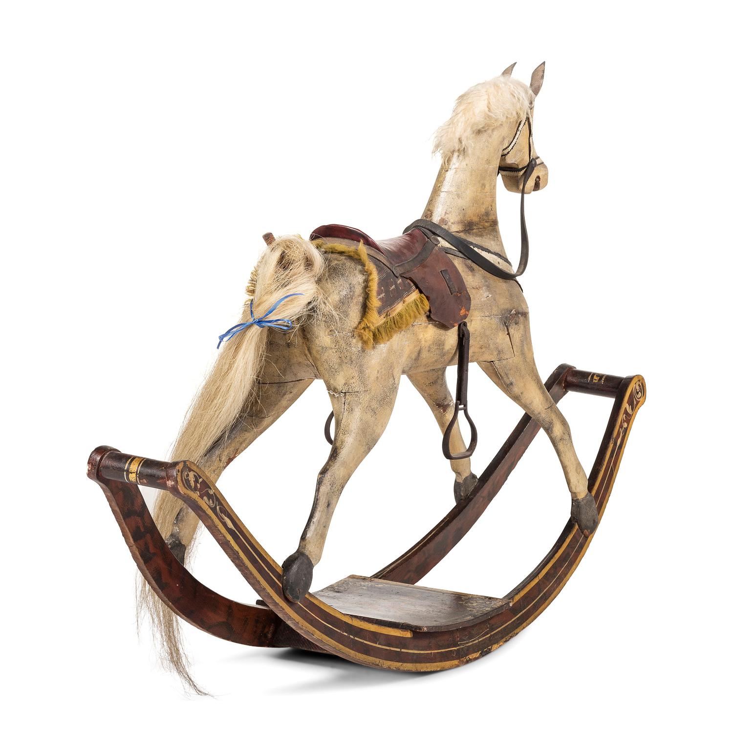 A Carved and Painted Wood Rocking Horse