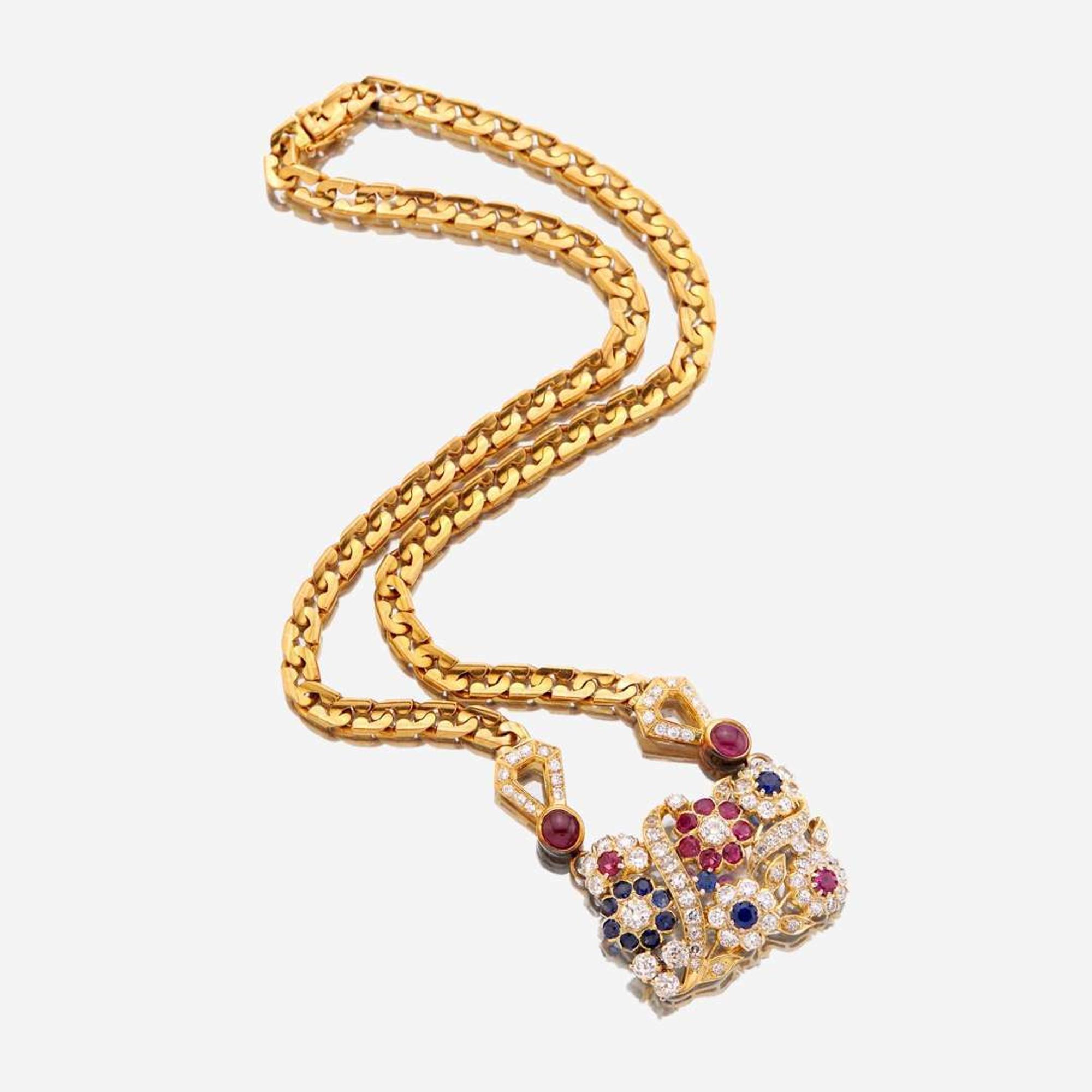 An eighteen karat gold, diamond, sapphire, and ruby necklace