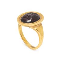 ATTILIO CODOGNATO, YELLOW GOLD AND GARNET INTAGLIO RING