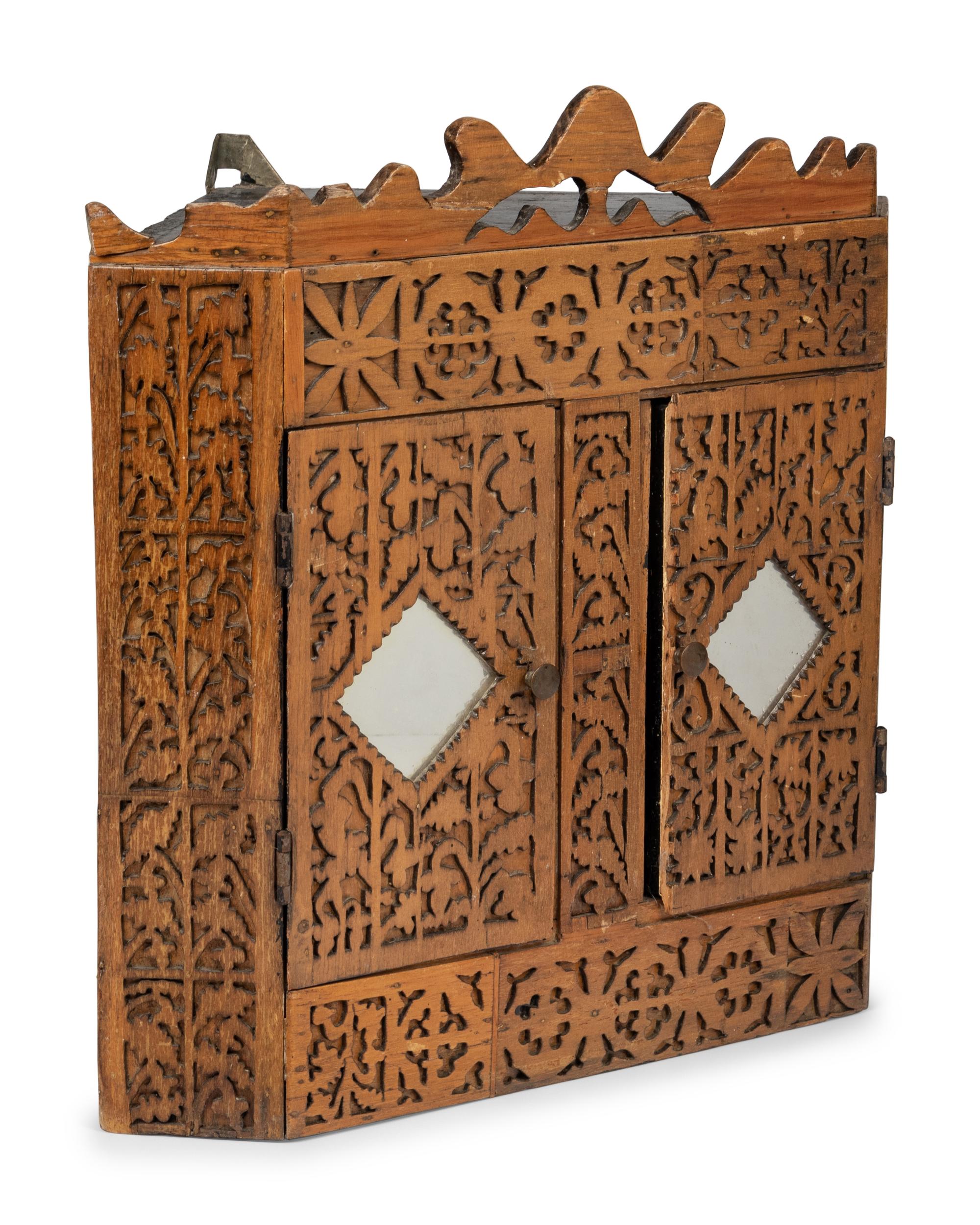 A Chip Carved Hanging Corner Cupboard