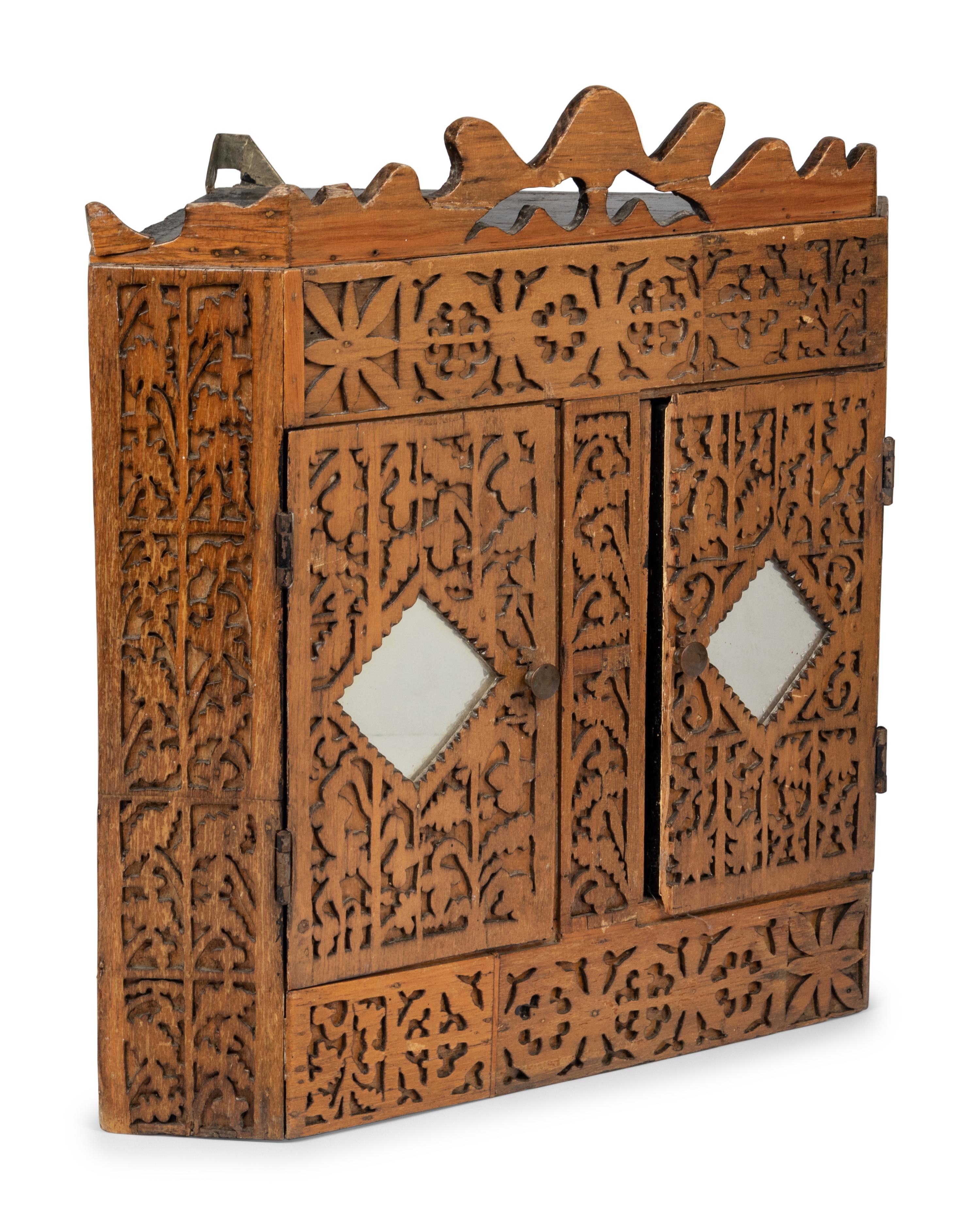 A Chip Carved Hanging Corner Cupboard