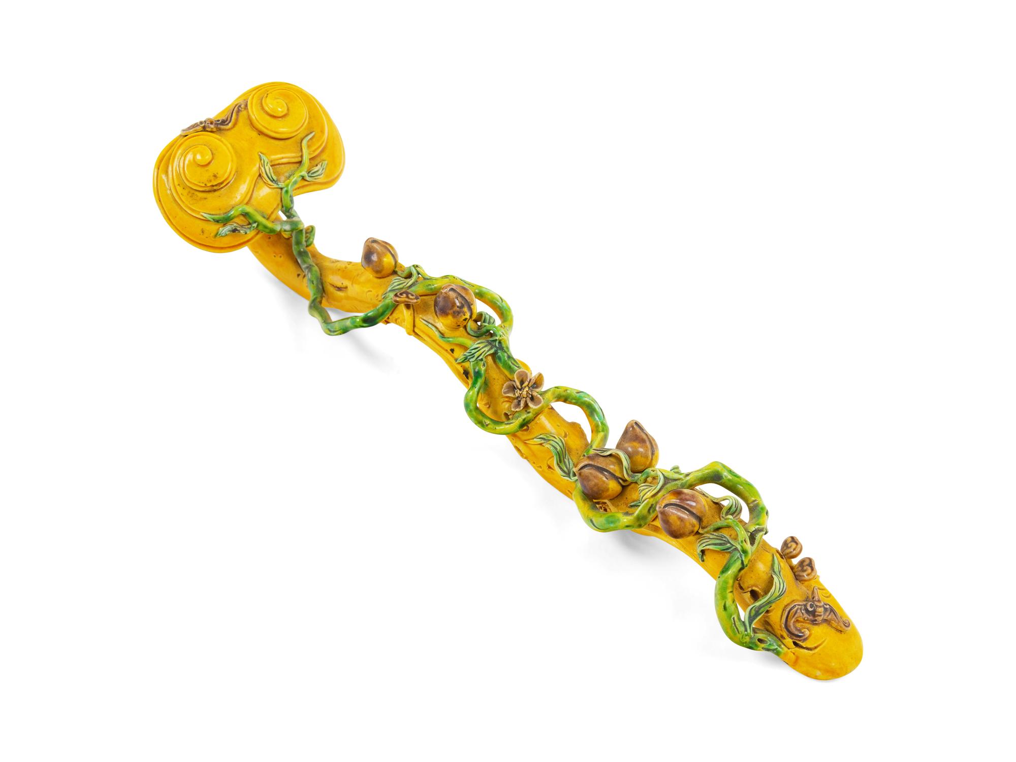 A Chinese Yellow Glazed Porcelain Ruyi Scepter