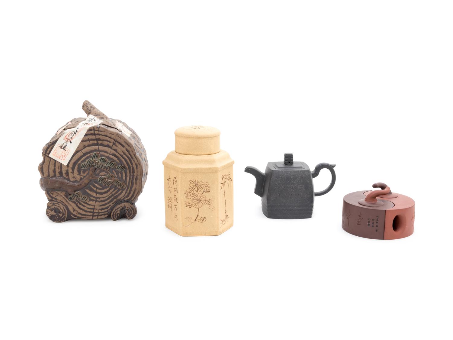 Four Chinese Yixing Pottery Teapots