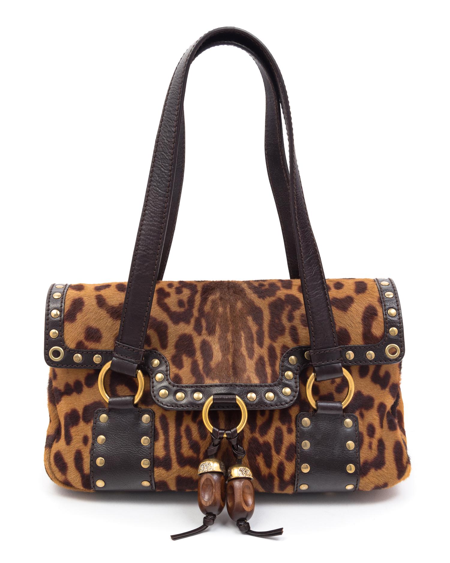 An Yves Saint Laurent Printed Calf Hair Shoulder Bag, 11" x 7" x 4".